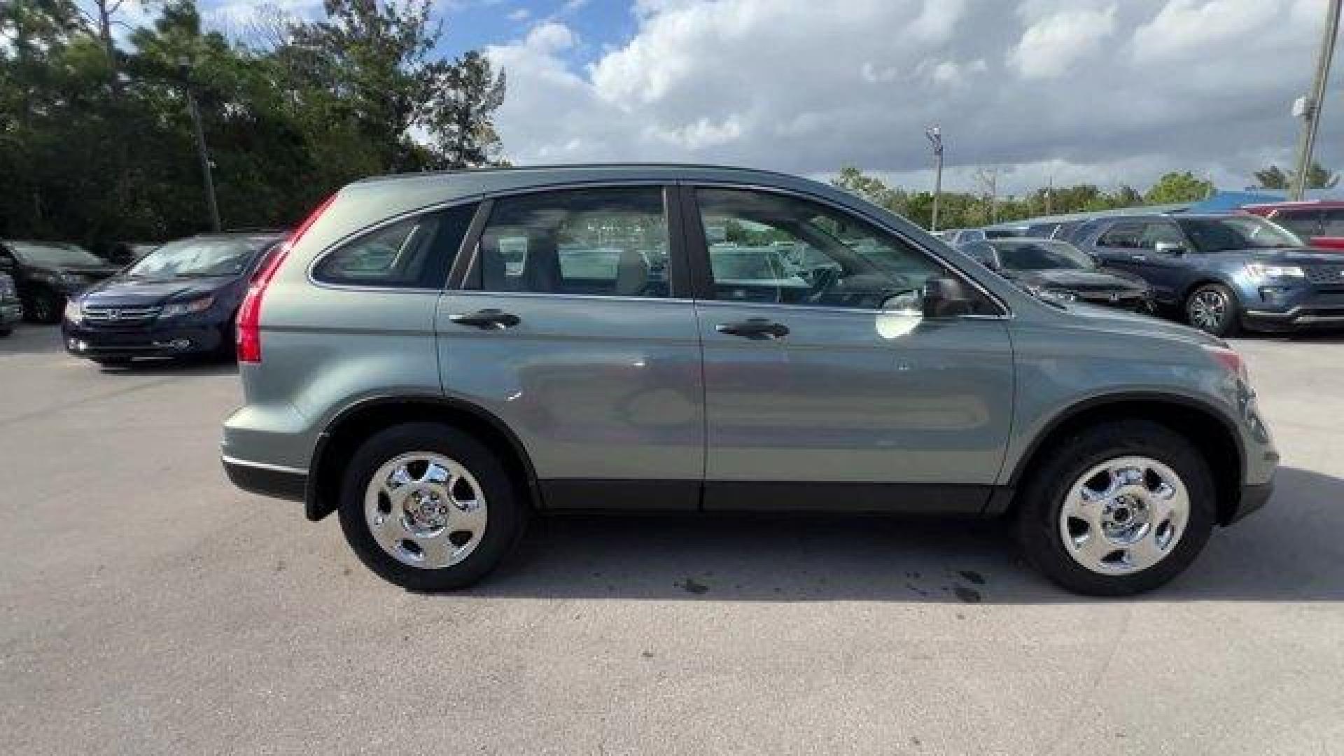 2011 Gray Honda CR-V (5J6RE3H3XBL) with an 4 2.4L engine, Automatic transmission, located at 27610 S Dixie Hwy, Homestead, FL, 33032, (305) 749-2348, 25.510241, -80.438301 - KBB.com Brand Image Awards. Only 145,688 Miles! Boasts 28 Highway MPG and 21 City MPG! This Honda CR-V boasts a Gas I4 2.4L/144 engine powering this Automatic transmission. Vehicle Stability Assist (VSA) w/traction control, Variable pwr rack-and-pinion steering, Upper and lower glove compartments. - Photo#4