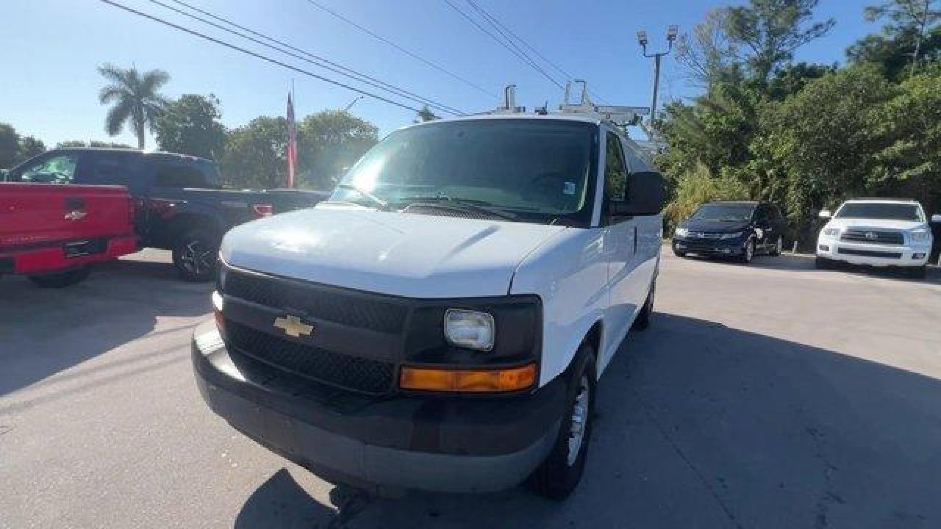 2015 Summit White /Medium Pewter Chevrolet Express Cargo Van (1GCWGFCF3F1) with an 8 4.8L engine, Automatic transmission, located at 27610 S Dixie Hwy, Homestead, FL, 33032, (305) 749-2348, 25.510241, -80.438301 - This Chevrolet Express Cargo Van delivers a Gas V8 4.8L/293 engine powering this Automatic transmission. TRANSMISSION, 6-SPEED AUTOMATIC, HEAVY-DUTY, ELECTRONICALLY CONTROLLED with overdrive tow/haul mode and internal transmission oil cooler (STD), TRAILERING EQUIPMENT, HEAVY-DUTY includes trailerin - Photo#0