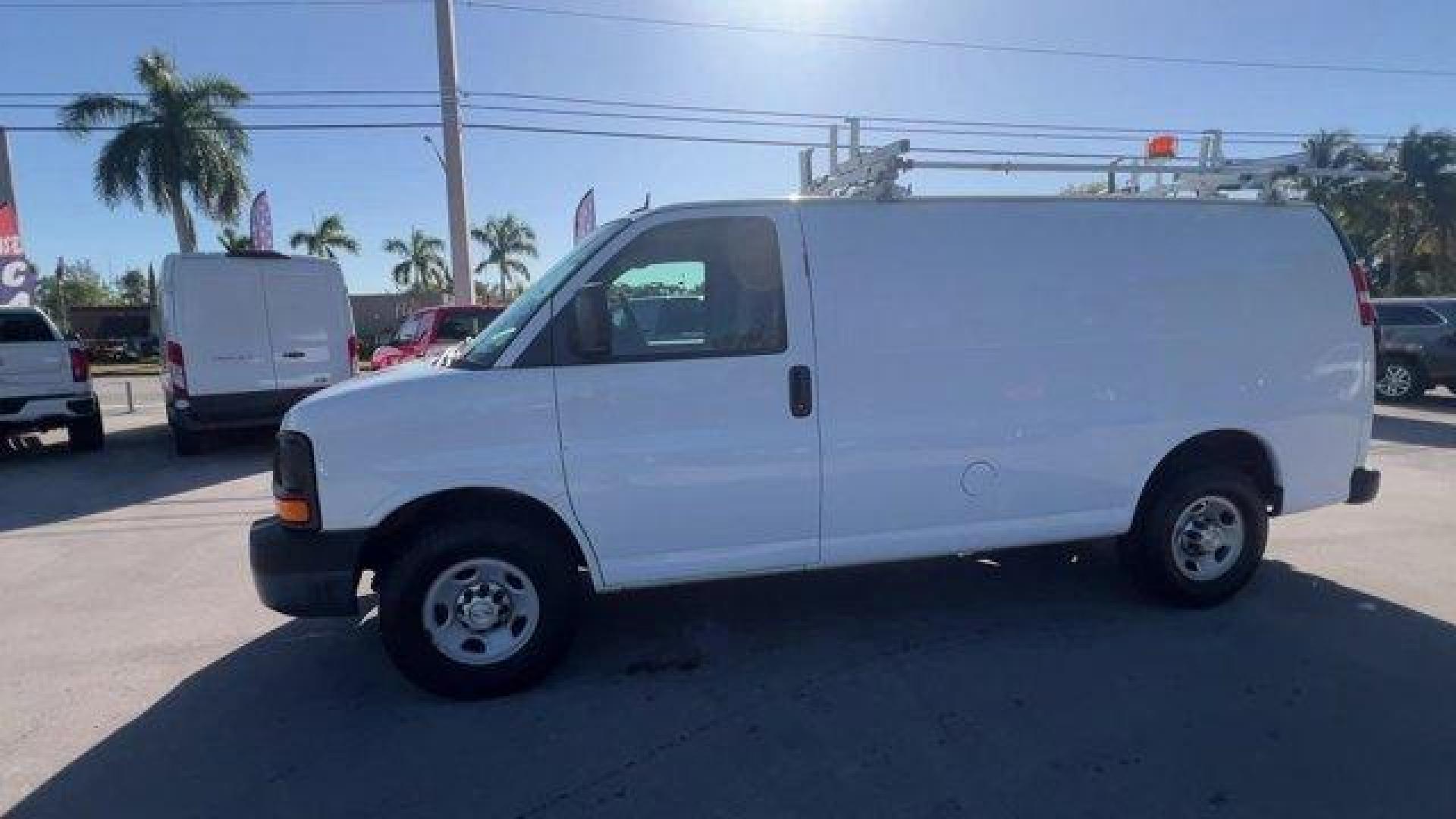 2015 Summit White /Medium Pewter Chevrolet Express Cargo Van (1GCWGFCF3F1) with an 8 4.8L engine, Automatic transmission, located at 27610 S Dixie Hwy, Homestead, FL, 33032, (305) 749-2348, 25.510241, -80.438301 - This Chevrolet Express Cargo Van delivers a Gas V8 4.8L/293 engine powering this Automatic transmission. TRANSMISSION, 6-SPEED AUTOMATIC, HEAVY-DUTY, ELECTRONICALLY CONTROLLED with overdrive tow/haul mode and internal transmission oil cooler (STD), TRAILERING EQUIPMENT, HEAVY-DUTY includes trailerin - Photo#1