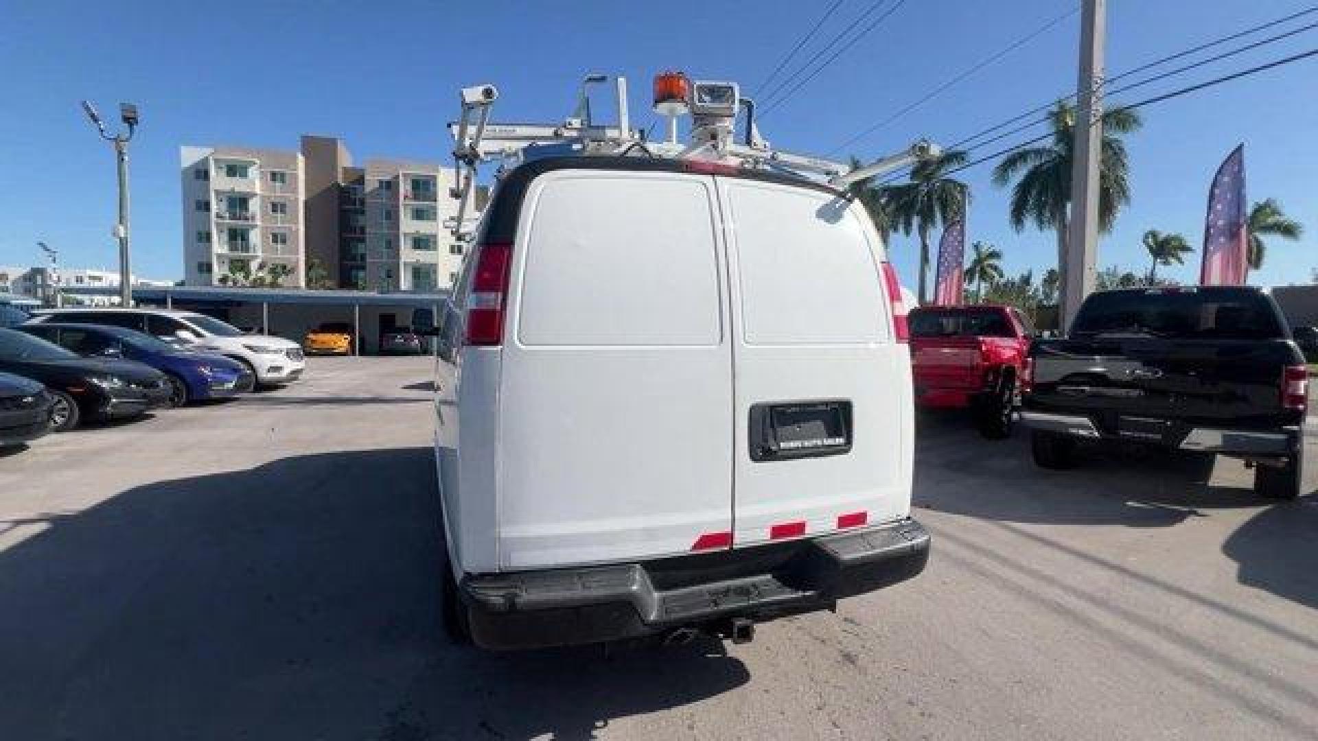 2015 Summit White /Medium Pewter Chevrolet Express Cargo Van (1GCWGFCF3F1) with an 8 4.8L engine, Automatic transmission, located at 27610 S Dixie Hwy, Homestead, FL, 33032, (305) 749-2348, 25.510241, -80.438301 - This Chevrolet Express Cargo Van delivers a Gas V8 4.8L/293 engine powering this Automatic transmission. TRANSMISSION, 6-SPEED AUTOMATIC, HEAVY-DUTY, ELECTRONICALLY CONTROLLED with overdrive tow/haul mode and internal transmission oil cooler (STD), TRAILERING EQUIPMENT, HEAVY-DUTY includes trailerin - Photo#3