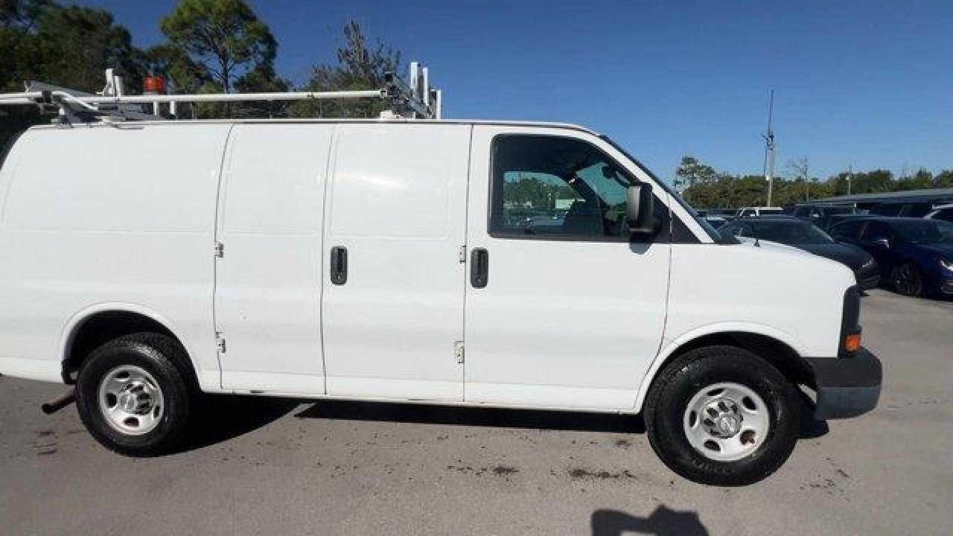 2015 Summit White /Medium Pewter Chevrolet Express Cargo Van (1GCWGFCF3F1) with an 8 4.8L engine, Automatic transmission, located at 27610 S Dixie Hwy, Homestead, FL, 33032, (305) 749-2348, 25.510241, -80.438301 - This Chevrolet Express Cargo Van delivers a Gas V8 4.8L/293 engine powering this Automatic transmission. TRANSMISSION, 6-SPEED AUTOMATIC, HEAVY-DUTY, ELECTRONICALLY CONTROLLED with overdrive tow/haul mode and internal transmission oil cooler (STD), TRAILERING EQUIPMENT, HEAVY-DUTY includes trailerin - Photo#5