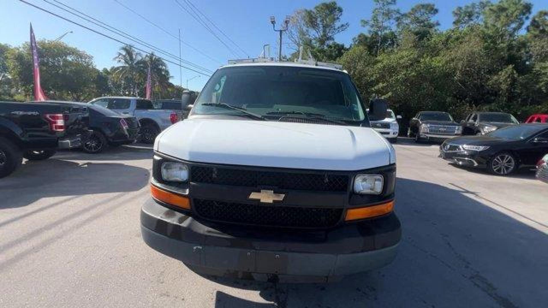 2015 Summit White /Medium Pewter Chevrolet Express Cargo Van (1GCWGFCF3F1) with an 8 4.8L engine, Automatic transmission, located at 27610 S Dixie Hwy, Homestead, FL, 33032, (305) 749-2348, 25.510241, -80.438301 - This Chevrolet Express Cargo Van delivers a Gas V8 4.8L/293 engine powering this Automatic transmission. TRANSMISSION, 6-SPEED AUTOMATIC, HEAVY-DUTY, ELECTRONICALLY CONTROLLED with overdrive tow/haul mode and internal transmission oil cooler (STD), TRAILERING EQUIPMENT, HEAVY-DUTY includes trailerin - Photo#7