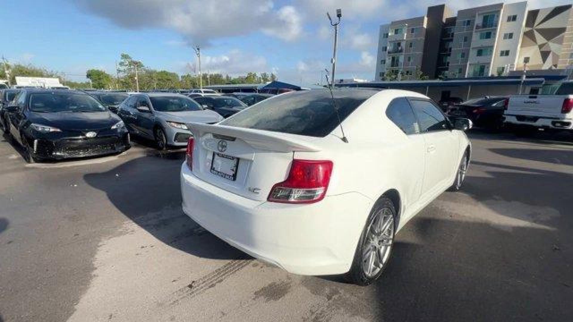 2013 White Scion tC (JTKJF5C75D3) with an 4 2.5L engine, Automatic transmission, located at 27610 S Dixie Hwy, Homestead, FL, 33032, (305) 749-2348, 25.510241, -80.438301 - IIHS Top Safety Pick. Only 122,737 Miles! Scores 31 Highway MPG and 23 City MPG! This Scion tC boasts a Gas I4 2.5L/152 engine powering this Automatic transmission. Vehicle stability control (VSC), Variable intermittent windshield wipers, Traction control.* This Scion tC Features the Following Optio - Photo#4