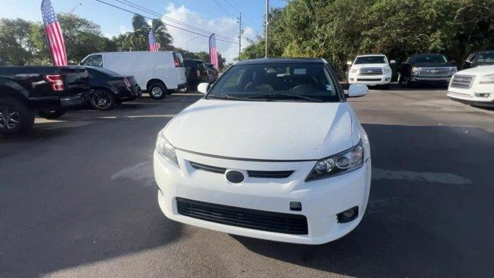 2013 White Scion tC (JTKJF5C75D3) with an 4 2.5L engine, Automatic transmission, located at 27610 S Dixie Hwy, Homestead, FL, 33032, (305) 749-2348, 25.510241, -80.438301 - IIHS Top Safety Pick. Only 122,737 Miles! Scores 31 Highway MPG and 23 City MPG! This Scion tC boasts a Gas I4 2.5L/152 engine powering this Automatic transmission. Vehicle stability control (VSC), Variable intermittent windshield wipers, Traction control.* This Scion tC Features the Following Optio - Photo#7