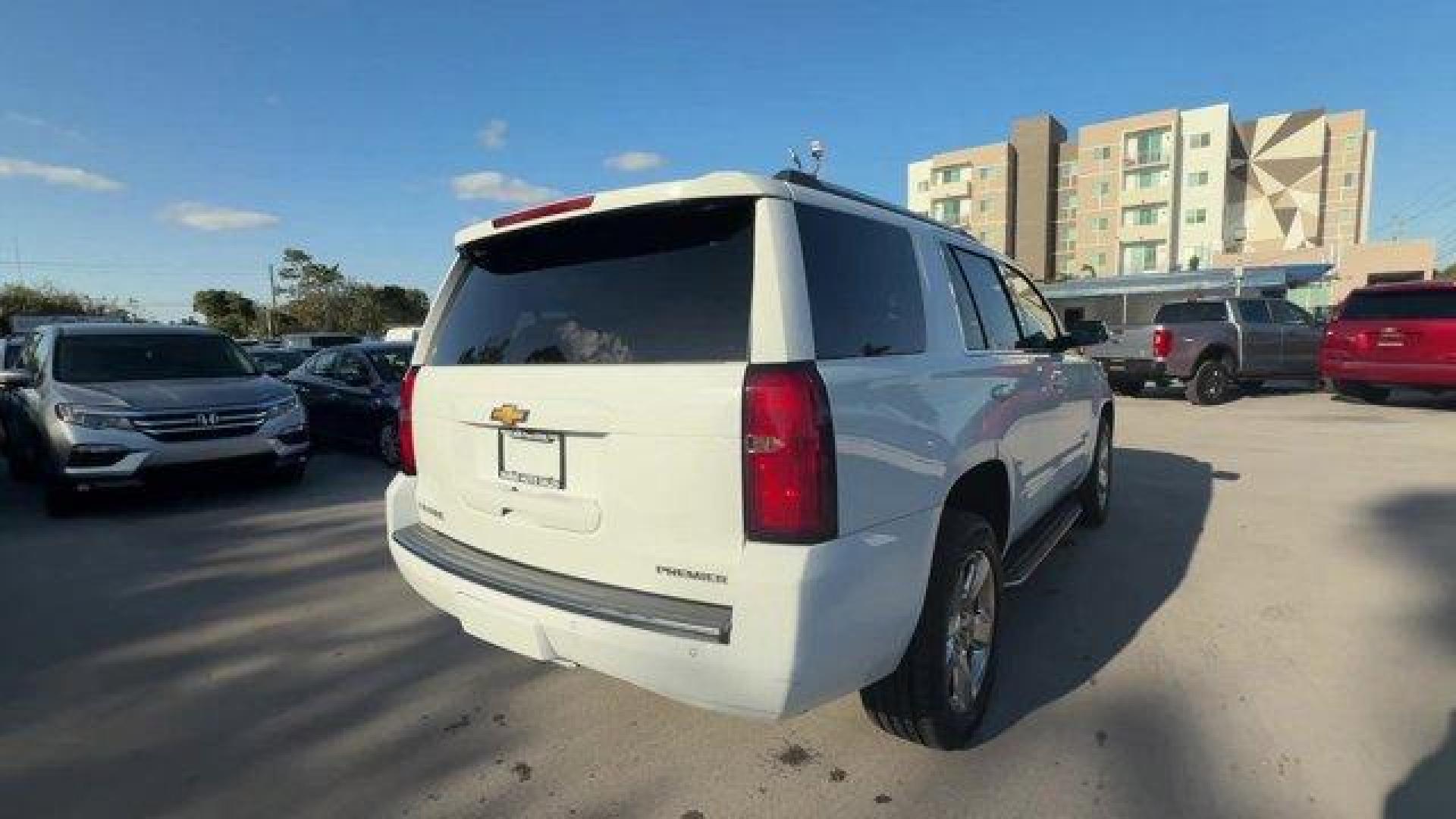 2019 Summit White /Jet Black Chevrolet Tahoe (1GNSCCKC6KR) with an 8 5.3L engine, Automatic transmission, located at 27610 S Dixie Hwy, Homestead, FL, 33032, (305) 749-2348, 25.510241, -80.438301 - KBB.com Best Resale Value Awards. Delivers 22 Highway MPG and 15 City MPG! This Chevrolet Tahoe boasts a Gas/Ethanol V8 5.3L/ engine powering this Automatic transmission. WHEELS, 20 X 9 (50.8 CM X 22.9 CM) POLISHED-ALUMINUM (STD), TRANSMISSION, 6-SPEED AUTOMATIC, ELECTRONICALLY CONTROLLED with overd - Photo#4