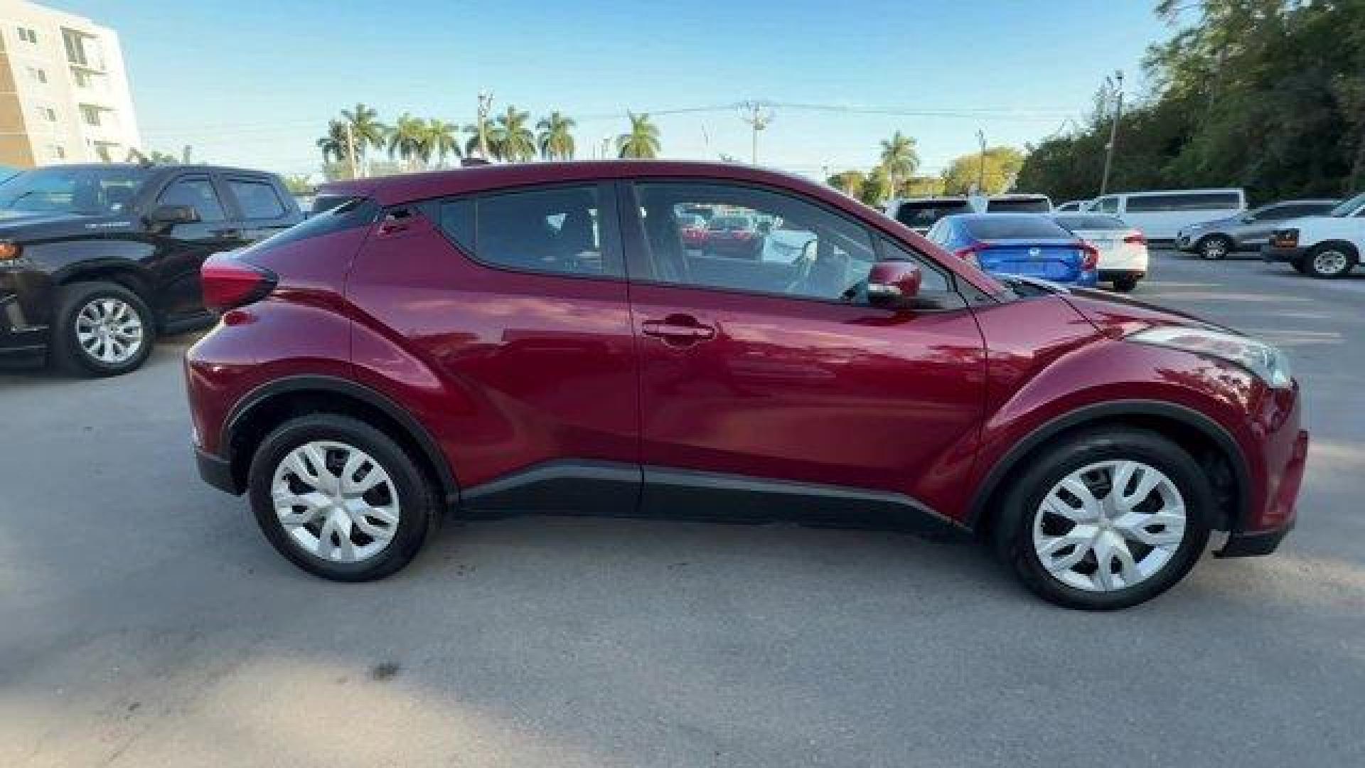 2019 Red Toyota C-HR (NMTKHMBX9KR) with an 4 2.0 L engine, Variable transmission, located at 27610 S Dixie Hwy, Homestead, FL, 33032, (305) 749-2348, 25.510241, -80.438301 - KBB.com Brand Image Awards. Delivers 31 Highway MPG and 27 City MPG! This Toyota C-HR delivers a Regular Unleaded I-4 2.0 L/121 engine powering this Variable transmission. Wing Spoiler, VSC Electronic Stability Control (ESC), Variable Intermittent Wipers.* This Toyota C-HR Features the Following Opt - Photo#4