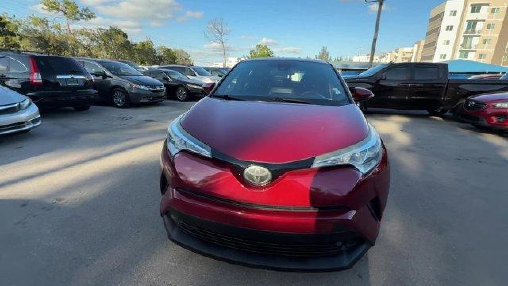 2019 Red Toyota C-HR (NMTKHMBX9KR) with an 4 2.0 L engine, Variable transmission, located at 27610 S Dixie Hwy, Homestead, FL, 33032, (305) 749-2348, 25.510241, -80.438301 - KBB.com Brand Image Awards. Delivers 31 Highway MPG and 27 City MPG! This Toyota C-HR delivers a Regular Unleaded I-4 2.0 L/121 engine powering this Variable transmission. Wing Spoiler, VSC Electronic Stability Control (ESC), Variable Intermittent Wipers.* This Toyota C-HR Features the Following Opt - Photo#6