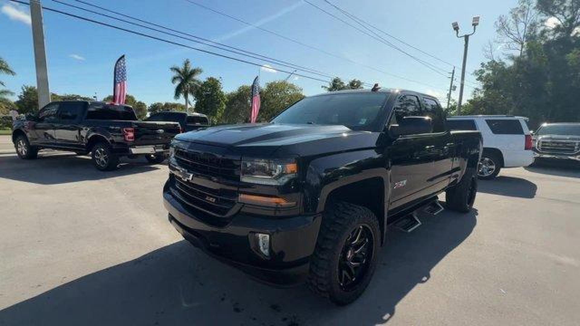 2018 Black /Jet Black Chevrolet Silverado 1500 (1GCVKREC2JZ) with an 8 5.3L engine, Automatic transmission, located at 27610 S Dixie Hwy, Homestead, FL, 33032, (305) 749-2348, 25.510241, -80.438301 - KBB.com 10 Most Awarded Brands. Delivers 22 Highway MPG and 16 City MPG! This Chevrolet Silverado 1500 delivers a Gas V8 5.3L/325 engine powering this Automatic transmission. WHEELS, 18 X 8.5 (45.7 CM X 21.6 CM) 5-SPOKE BLACK PAINT ALLOY, TRANSMISSION, 6-SPEED AUTOMATIC, ELECTRONICALLY CONTROLLED wi - Photo#0