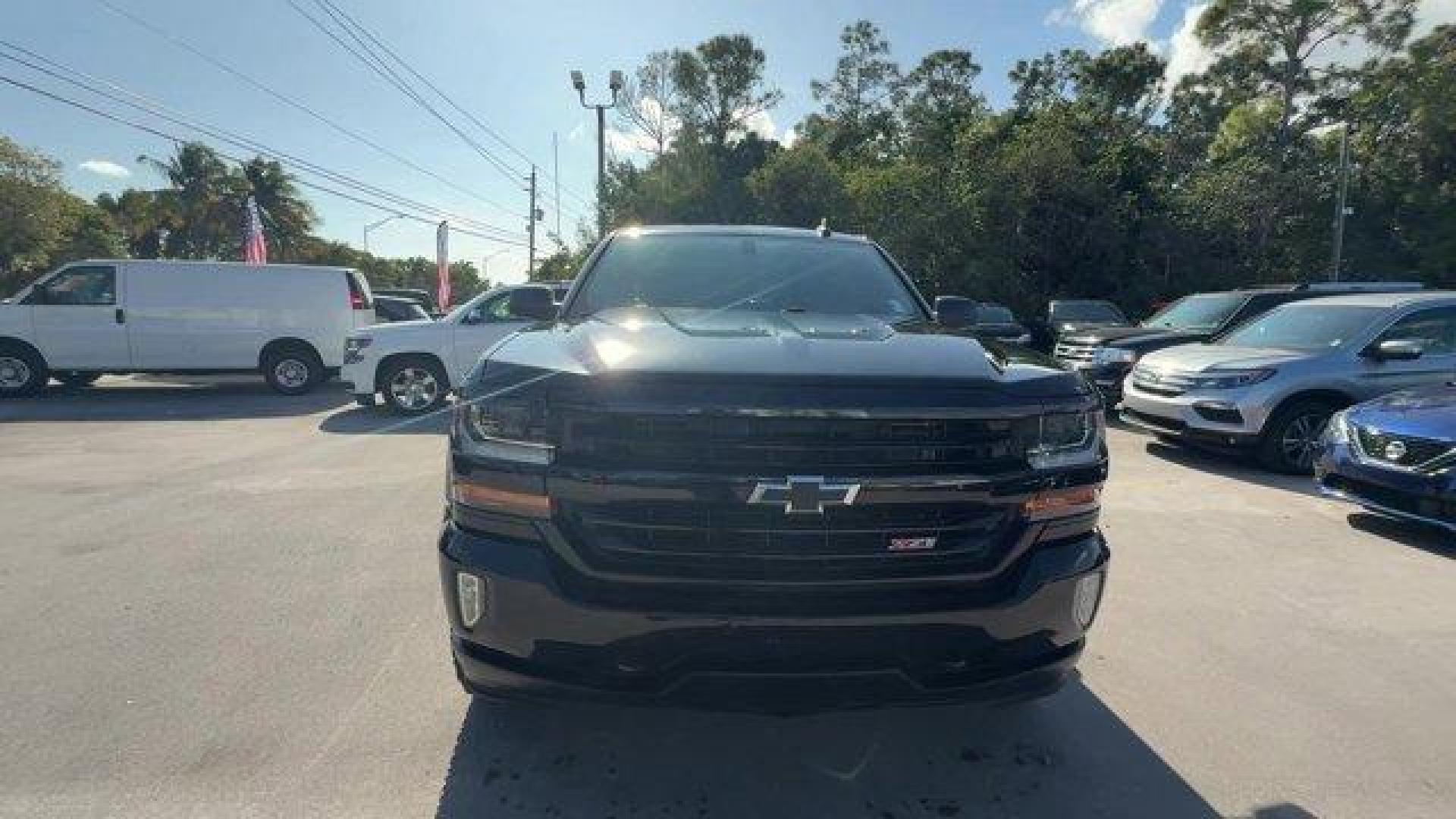 2018 Black /Jet Black Chevrolet Silverado 1500 (1GCVKREC2JZ) with an 8 5.3L engine, Automatic transmission, located at 27610 S Dixie Hwy, Homestead, FL, 33032, (305) 749-2348, 25.510241, -80.438301 - KBB.com 10 Most Awarded Brands. Delivers 22 Highway MPG and 16 City MPG! This Chevrolet Silverado 1500 delivers a Gas V8 5.3L/325 engine powering this Automatic transmission. WHEELS, 18 X 8.5 (45.7 CM X 21.6 CM) 5-SPOKE BLACK PAINT ALLOY, TRANSMISSION, 6-SPEED AUTOMATIC, ELECTRONICALLY CONTROLLED wi - Photo#7