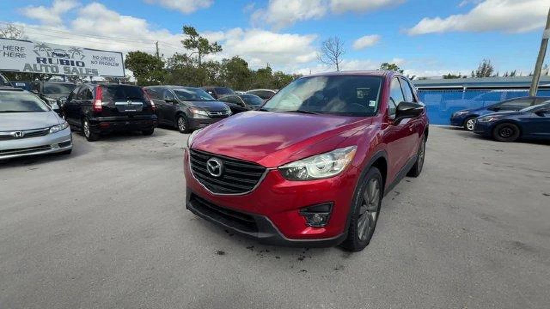 2016 Soul Red Metallic /Black Mazda CX-5 (JM3KE2CY4G0) with an 4 2.5 L engine, Automatic transmission, located at 27610 S Dixie Hwy, Homestead, FL, 33032, (305) 749-2348, 25.510241, -80.438301 - Only 10,120 Miles! Boasts 33 Highway MPG and 26 City MPG! This Mazda CX-5 delivers a Regular Unleaded I-4 2.5 L/152 engine powering this Automatic transmission. SOUL RED METALLIC PAINT, SOUL RED METALLIC, BLACK, CLOTH SEAT TRIM.*This Mazda CX-5 Comes Equipped with These Options *Wheels: 17 x 7J Alum - Photo#0