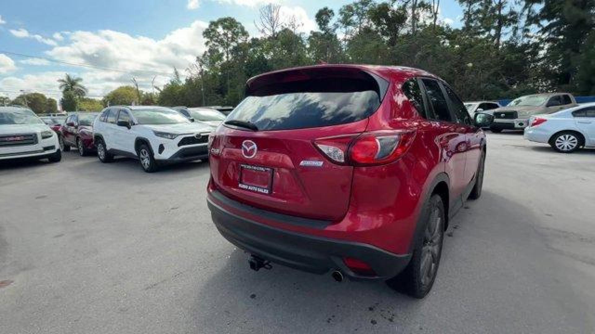 2016 Soul Red Metallic /Black Mazda CX-5 (JM3KE2CY4G0) with an 4 2.5 L engine, Automatic transmission, located at 27610 S Dixie Hwy, Homestead, FL, 33032, (305) 749-2348, 25.510241, -80.438301 - Only 10,120 Miles! Boasts 33 Highway MPG and 26 City MPG! This Mazda CX-5 delivers a Regular Unleaded I-4 2.5 L/152 engine powering this Automatic transmission. SOUL RED METALLIC PAINT, SOUL RED METALLIC, BLACK, CLOTH SEAT TRIM.*This Mazda CX-5 Comes Equipped with These Options *Wheels: 17 x 7J Alum - Photo#4