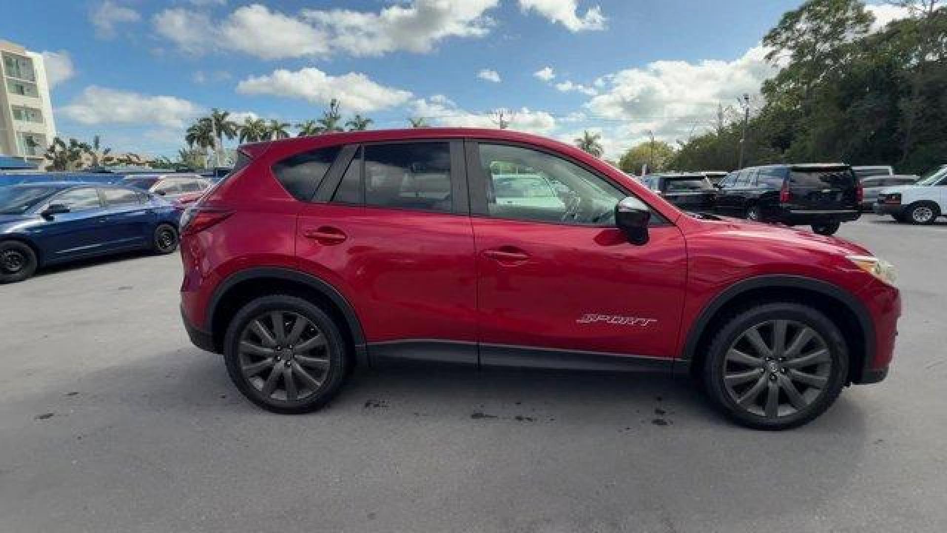 2016 Soul Red Metallic /Black Mazda CX-5 (JM3KE2CY4G0) with an 4 2.5 L engine, Automatic transmission, located at 27610 S Dixie Hwy, Homestead, FL, 33032, (305) 749-2348, 25.510241, -80.438301 - Only 10,120 Miles! Boasts 33 Highway MPG and 26 City MPG! This Mazda CX-5 delivers a Regular Unleaded I-4 2.5 L/152 engine powering this Automatic transmission. SOUL RED METALLIC PAINT, SOUL RED METALLIC, BLACK, CLOTH SEAT TRIM.*This Mazda CX-5 Comes Equipped with These Options *Wheels: 17 x 7J Alum - Photo#5