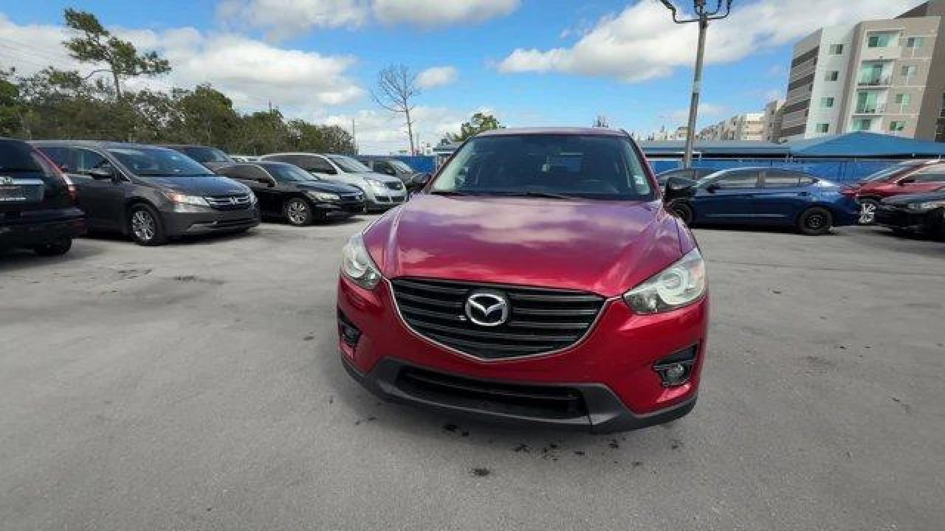 2016 Soul Red Metallic /Black Mazda CX-5 (JM3KE2CY4G0) with an 4 2.5 L engine, Automatic transmission, located at 27610 S Dixie Hwy, Homestead, FL, 33032, (305) 749-2348, 25.510241, -80.438301 - Only 10,120 Miles! Boasts 33 Highway MPG and 26 City MPG! This Mazda CX-5 delivers a Regular Unleaded I-4 2.5 L/152 engine powering this Automatic transmission. SOUL RED METALLIC PAINT, SOUL RED METALLIC, BLACK, CLOTH SEAT TRIM.*This Mazda CX-5 Comes Equipped with These Options *Wheels: 17 x 7J Alum - Photo#7