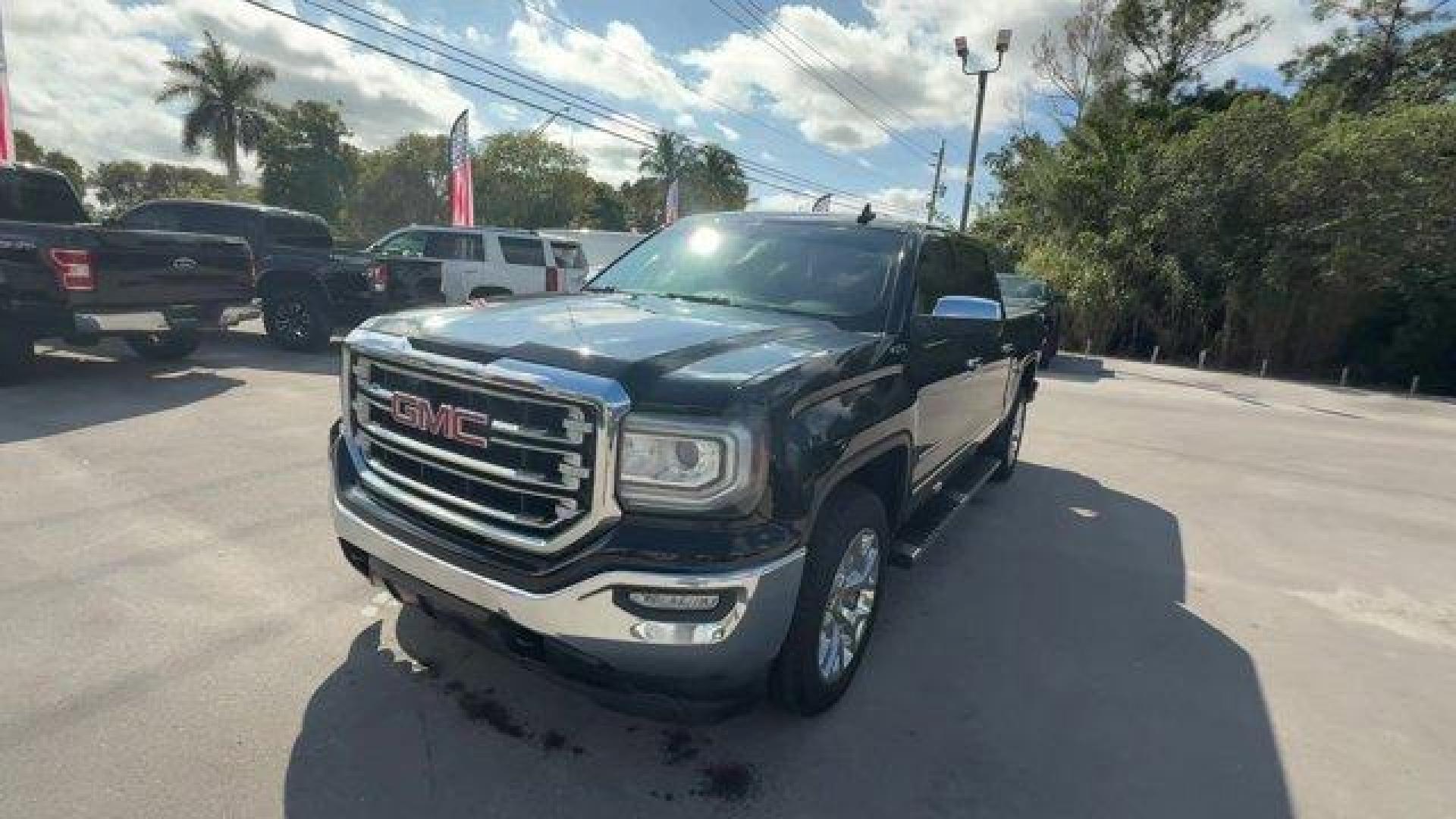 2017 Onyx Black /Jet Black GMC Sierra 1500 (3GTU2NEC7HG) with an 8 5.3L engine, Automatic transmission, located at 27610 S Dixie Hwy, Homestead, FL, 33032, (305) 749-2348, 25.510241, -80.438301 - KBB.com Brand Image Awards. Scores 22 Highway MPG and 16 City MPG! This GMC Sierra 1500 delivers a Gas V8 5.3L/325 engine powering this Automatic transmission. WIRELESS CHARGING, WHEELS, 20 X 9 (50.8 CM X 22.9 CM) POLISHED ALUMINUM, TRANSMISSION, 6-SPEED AUTOMATIC, ELECTRONICALLY CONTROLLED with ove - Photo#0