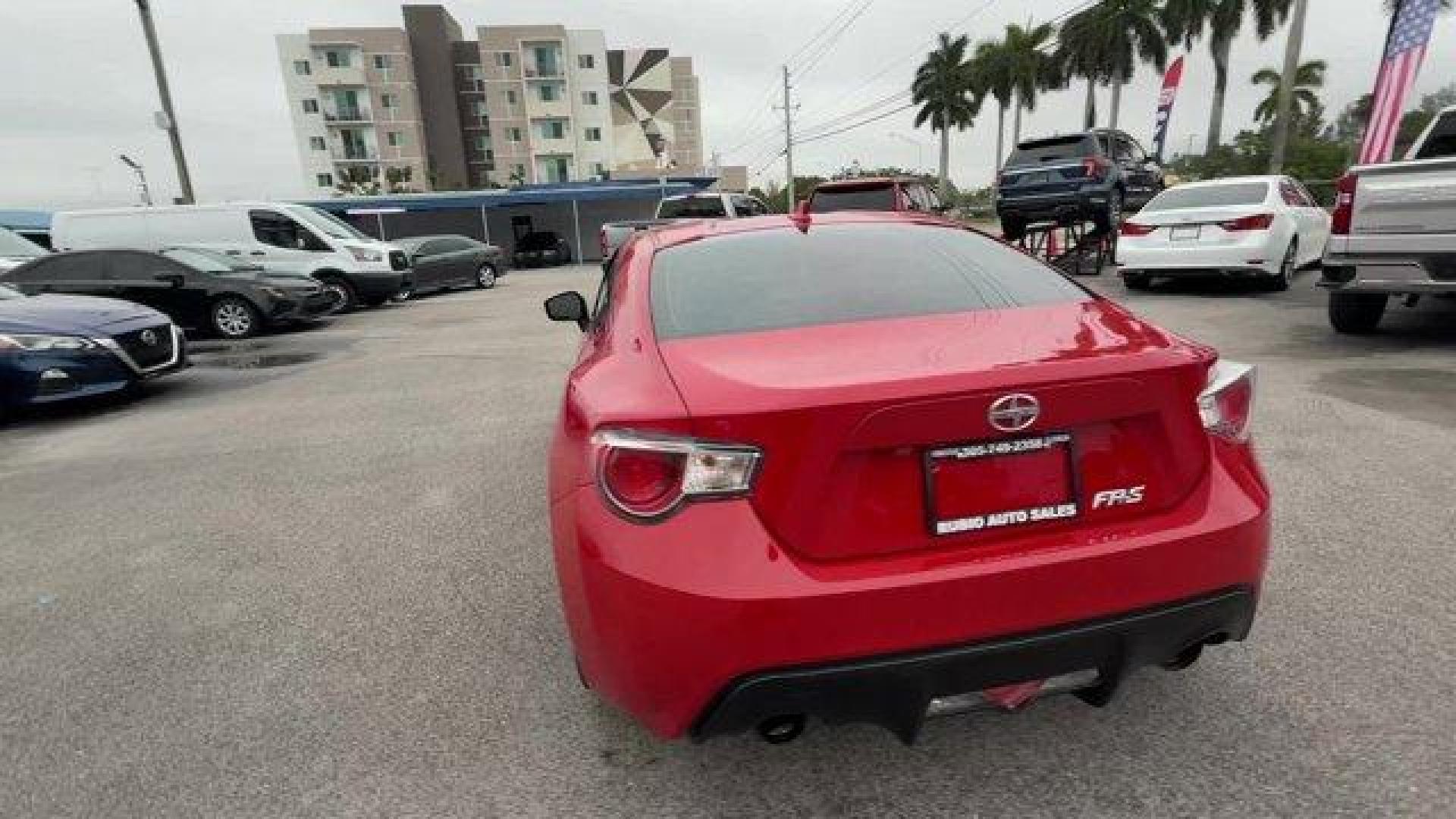 2015 Red Scion FR-S (JF1ZNAA12F8) with an 4 2.0 L engine, Automatic transmission, located at 27610 S Dixie Hwy, Homestead, FL, 33032, (305) 749-2348, 25.510241, -80.438301 - Scores 34 Highway MPG and 25 City MPG! This Scion FR-S delivers a Premium Unleaded H-4 2.0 L/122 engine powering this Automatic transmission. Wheels: 17 x 7 Alloy, Variable Intermittent Wipers, Valet Function.*This Scion FR-S Comes Equipped with These Options *Trunk Rear Cargo Access, Trip Computer, - Photo#2