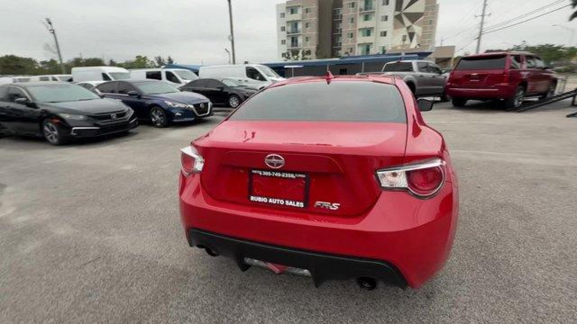 2015 Red Scion FR-S (JF1ZNAA12F8) with an 4 2.0 L engine, Automatic transmission, located at 27610 S Dixie Hwy, Homestead, FL, 33032, (305) 749-2348, 25.510241, -80.438301 - Scores 34 Highway MPG and 25 City MPG! This Scion FR-S delivers a Premium Unleaded H-4 2.0 L/122 engine powering this Automatic transmission. Wheels: 17 x 7 Alloy, Variable Intermittent Wipers, Valet Function.*This Scion FR-S Comes Equipped with These Options *Trunk Rear Cargo Access, Trip Computer, - Photo#3