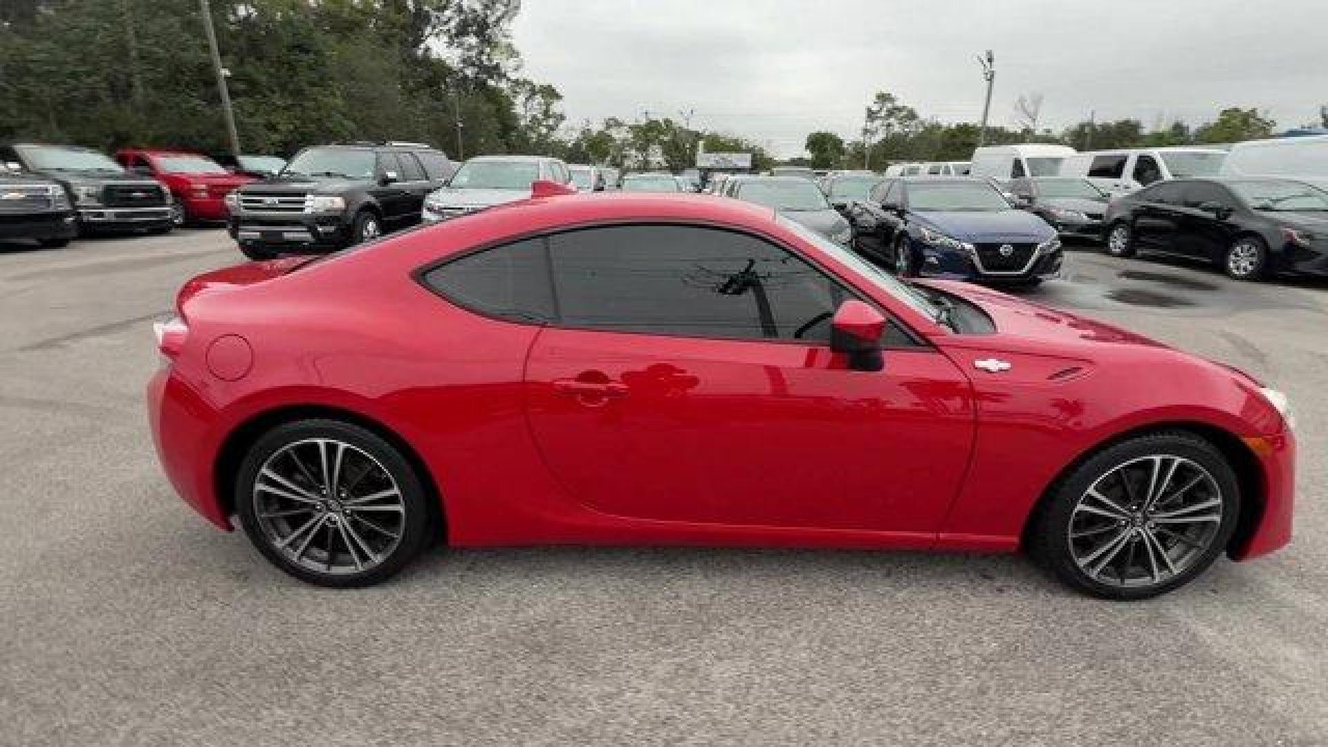 2015 Red Scion FR-S (JF1ZNAA12F8) with an 4 2.0 L engine, Automatic transmission, located at 27610 S Dixie Hwy, Homestead, FL, 33032, (305) 749-2348, 25.510241, -80.438301 - Scores 34 Highway MPG and 25 City MPG! This Scion FR-S delivers a Premium Unleaded H-4 2.0 L/122 engine powering this Automatic transmission. Wheels: 17 x 7 Alloy, Variable Intermittent Wipers, Valet Function.*This Scion FR-S Comes Equipped with These Options *Trunk Rear Cargo Access, Trip Computer, - Photo#5