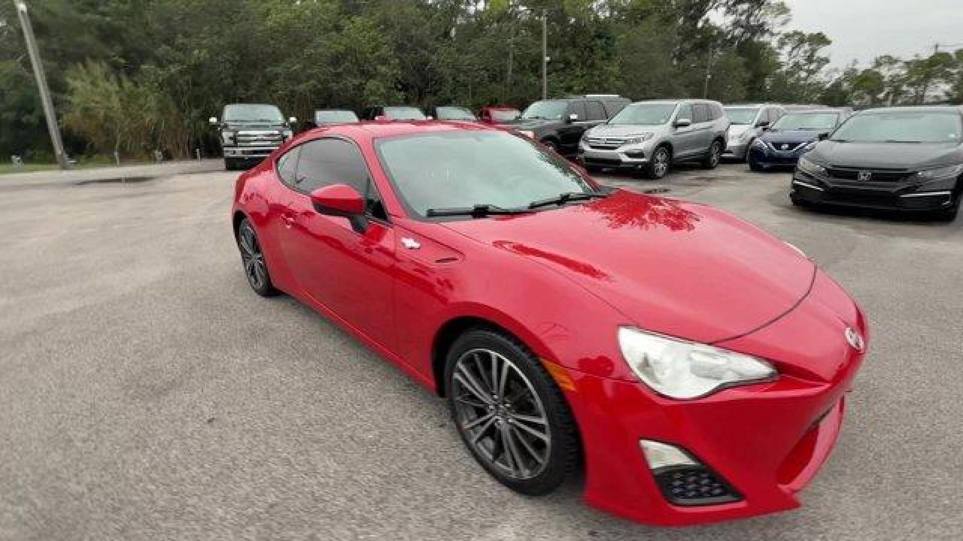 2015 Red Scion FR-S (JF1ZNAA12F8) with an 4 2.0 L engine, Automatic transmission, located at 27610 S Dixie Hwy, Homestead, FL, 33032, (305) 749-2348, 25.510241, -80.438301 - Scores 34 Highway MPG and 25 City MPG! This Scion FR-S delivers a Premium Unleaded H-4 2.0 L/122 engine powering this Automatic transmission. Wheels: 17 x 7 Alloy, Variable Intermittent Wipers, Valet Function.*This Scion FR-S Comes Equipped with These Options *Trunk Rear Cargo Access, Trip Computer, - Photo#6