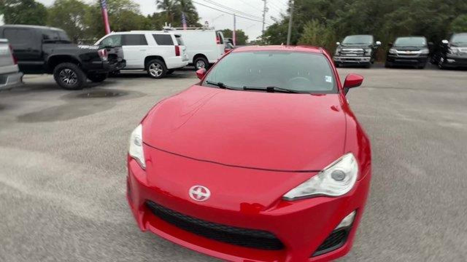 2015 Red Scion FR-S (JF1ZNAA12F8) with an 4 2.0 L engine, Automatic transmission, located at 27610 S Dixie Hwy, Homestead, FL, 33032, (305) 749-2348, 25.510241, -80.438301 - Scores 34 Highway MPG and 25 City MPG! This Scion FR-S delivers a Premium Unleaded H-4 2.0 L/122 engine powering this Automatic transmission. Wheels: 17 x 7 Alloy, Variable Intermittent Wipers, Valet Function.*This Scion FR-S Comes Equipped with These Options *Trunk Rear Cargo Access, Trip Computer, - Photo#7