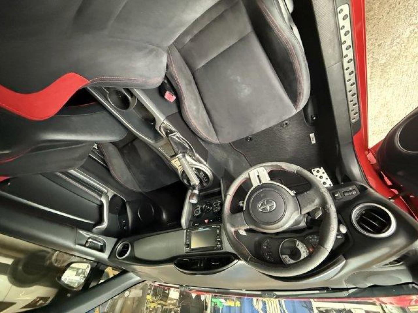 2015 Red Scion FR-S (JF1ZNAA12F8) with an 4 2.0 L engine, Automatic transmission, located at 27610 S Dixie Hwy, Homestead, FL, 33032, (305) 749-2348, 25.510241, -80.438301 - Scores 34 Highway MPG and 25 City MPG! This Scion FR-S delivers a Premium Unleaded H-4 2.0 L/122 engine powering this Automatic transmission. Wheels: 17 x 7 Alloy, Variable Intermittent Wipers, Valet Function.*This Scion FR-S Comes Equipped with These Options *Trunk Rear Cargo Access, Trip Computer, - Photo#11