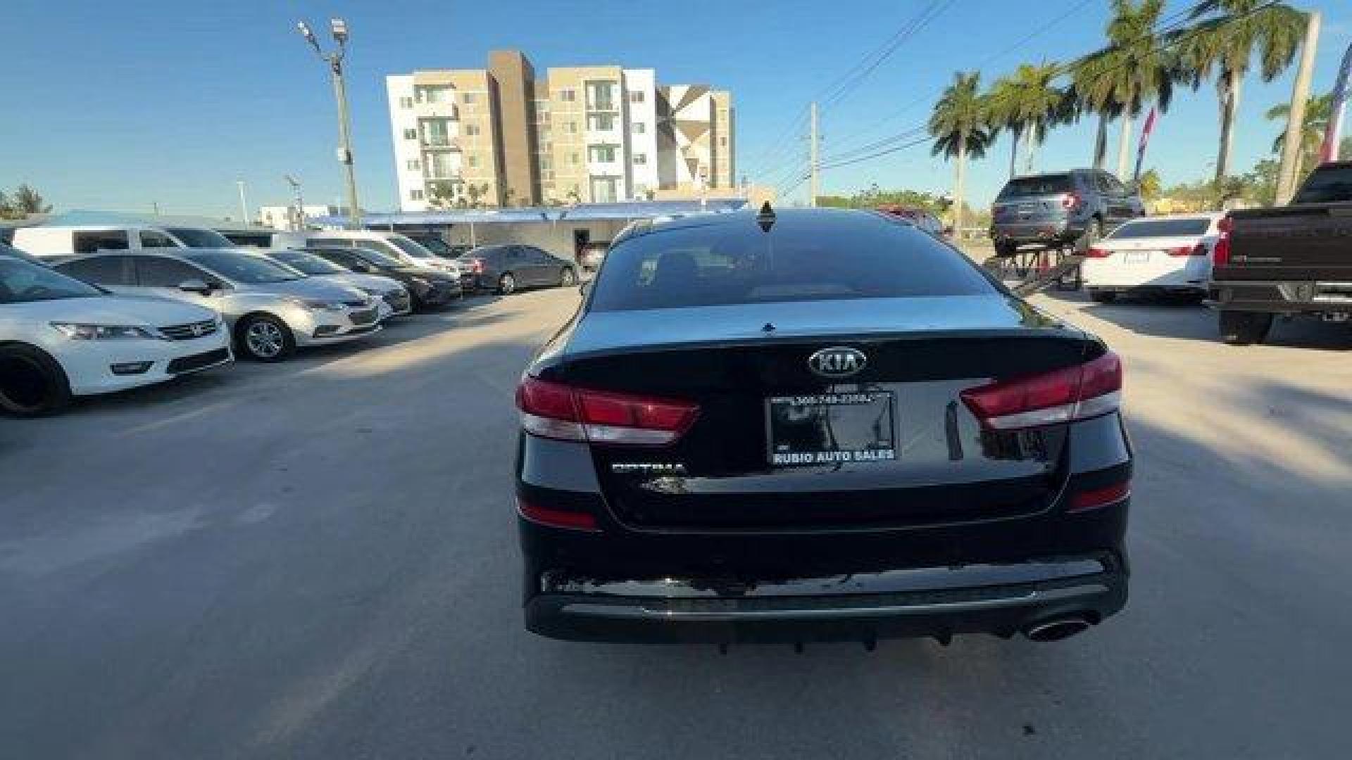 2019 Ebony Black /Black Kia Optima (5XXGT4L38KG) with an 4 2.4 L engine, Automatic transmission, located at 27610 S Dixie Hwy, Homestead, FL, 33032, (305) 749-2348, 25.510241, -80.438301 - KBB.com 10 Best Sedans Under $30,000. Boasts 33 Highway MPG and 24 City MPG! This Kia Optima boasts a Regular Unleaded I-4 2.4 L/144 engine powering this Automatic transmission. REAR BUMPER APPLIQUE, LX PREMIUM PACKAGE -inc: Gloss Black Door Pillars, 10-Way Power Adjustable Driver's Seat, 2-way powe - Photo#3