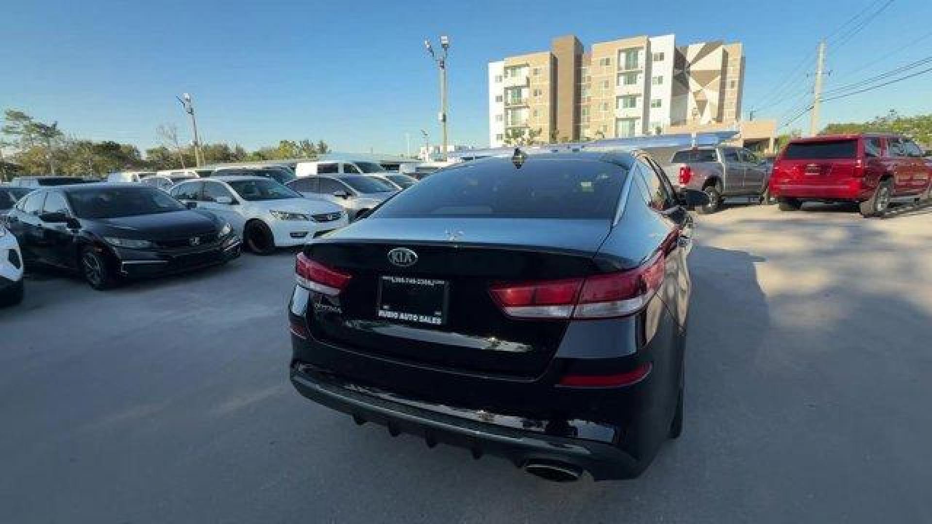 2019 Ebony Black /Black Kia Optima (5XXGT4L38KG) with an 4 2.4 L engine, Automatic transmission, located at 27610 S Dixie Hwy, Homestead, FL, 33032, (305) 749-2348, 25.510241, -80.438301 - KBB.com 10 Best Sedans Under $30,000. Boasts 33 Highway MPG and 24 City MPG! This Kia Optima boasts a Regular Unleaded I-4 2.4 L/144 engine powering this Automatic transmission. REAR BUMPER APPLIQUE, LX PREMIUM PACKAGE -inc: Gloss Black Door Pillars, 10-Way Power Adjustable Driver's Seat, 2-way powe - Photo#4