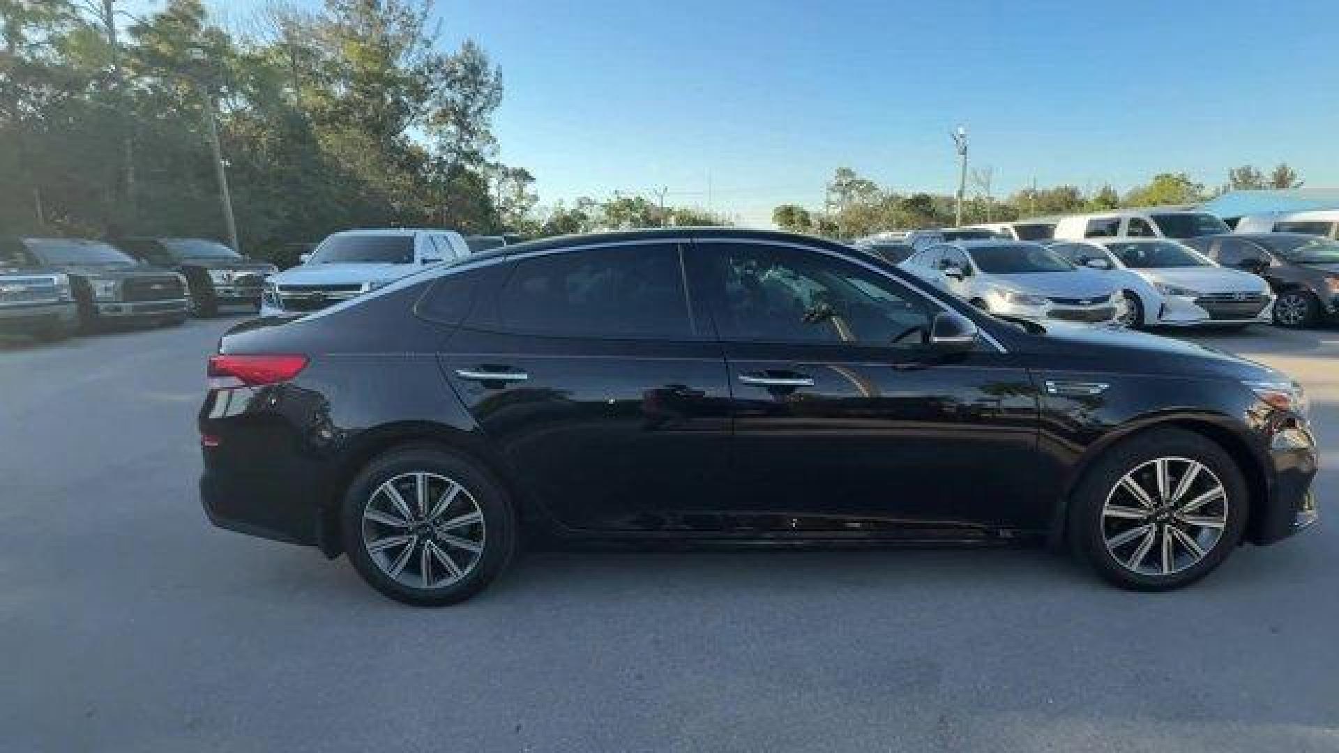 2019 Ebony Black /Black Kia Optima (5XXGT4L38KG) with an 4 2.4 L engine, Automatic transmission, located at 27610 S Dixie Hwy, Homestead, FL, 33032, (305) 749-2348, 25.510241, -80.438301 - KBB.com 10 Best Sedans Under $30,000. Boasts 33 Highway MPG and 24 City MPG! This Kia Optima boasts a Regular Unleaded I-4 2.4 L/144 engine powering this Automatic transmission. REAR BUMPER APPLIQUE, LX PREMIUM PACKAGE -inc: Gloss Black Door Pillars, 10-Way Power Adjustable Driver's Seat, 2-way powe - Photo#5