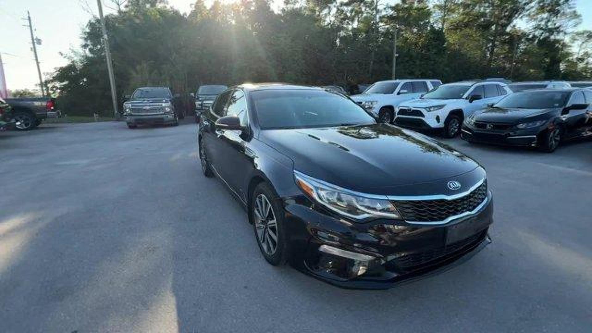 2019 Ebony Black /Black Kia Optima (5XXGT4L38KG) with an 4 2.4 L engine, Automatic transmission, located at 27610 S Dixie Hwy, Homestead, FL, 33032, (305) 749-2348, 25.510241, -80.438301 - KBB.com 10 Best Sedans Under $30,000. Boasts 33 Highway MPG and 24 City MPG! This Kia Optima boasts a Regular Unleaded I-4 2.4 L/144 engine powering this Automatic transmission. REAR BUMPER APPLIQUE, LX PREMIUM PACKAGE -inc: Gloss Black Door Pillars, 10-Way Power Adjustable Driver's Seat, 2-way powe - Photo#6