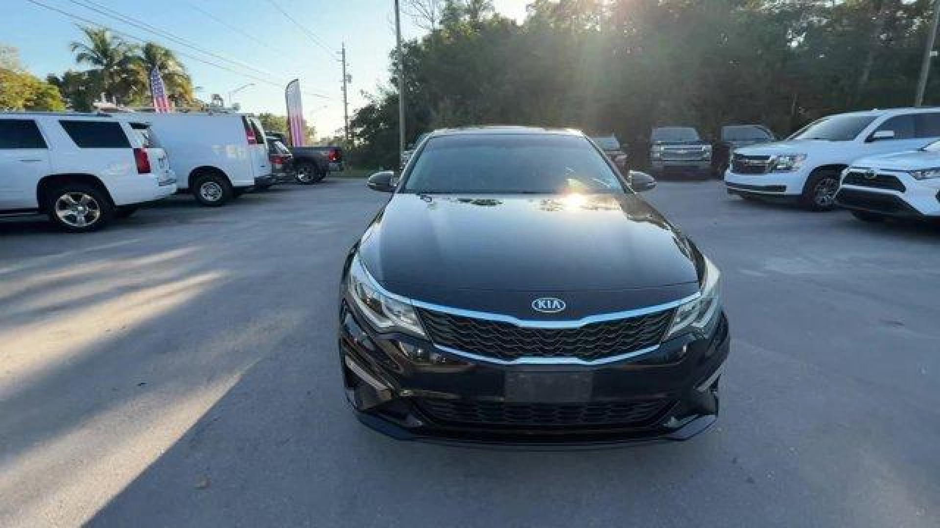 2019 Ebony Black /Black Kia Optima (5XXGT4L38KG) with an 4 2.4 L engine, Automatic transmission, located at 27610 S Dixie Hwy, Homestead, FL, 33032, (305) 749-2348, 25.510241, -80.438301 - KBB.com 10 Best Sedans Under $30,000. Boasts 33 Highway MPG and 24 City MPG! This Kia Optima boasts a Regular Unleaded I-4 2.4 L/144 engine powering this Automatic transmission. REAR BUMPER APPLIQUE, LX PREMIUM PACKAGE -inc: Gloss Black Door Pillars, 10-Way Power Adjustable Driver's Seat, 2-way powe - Photo#7