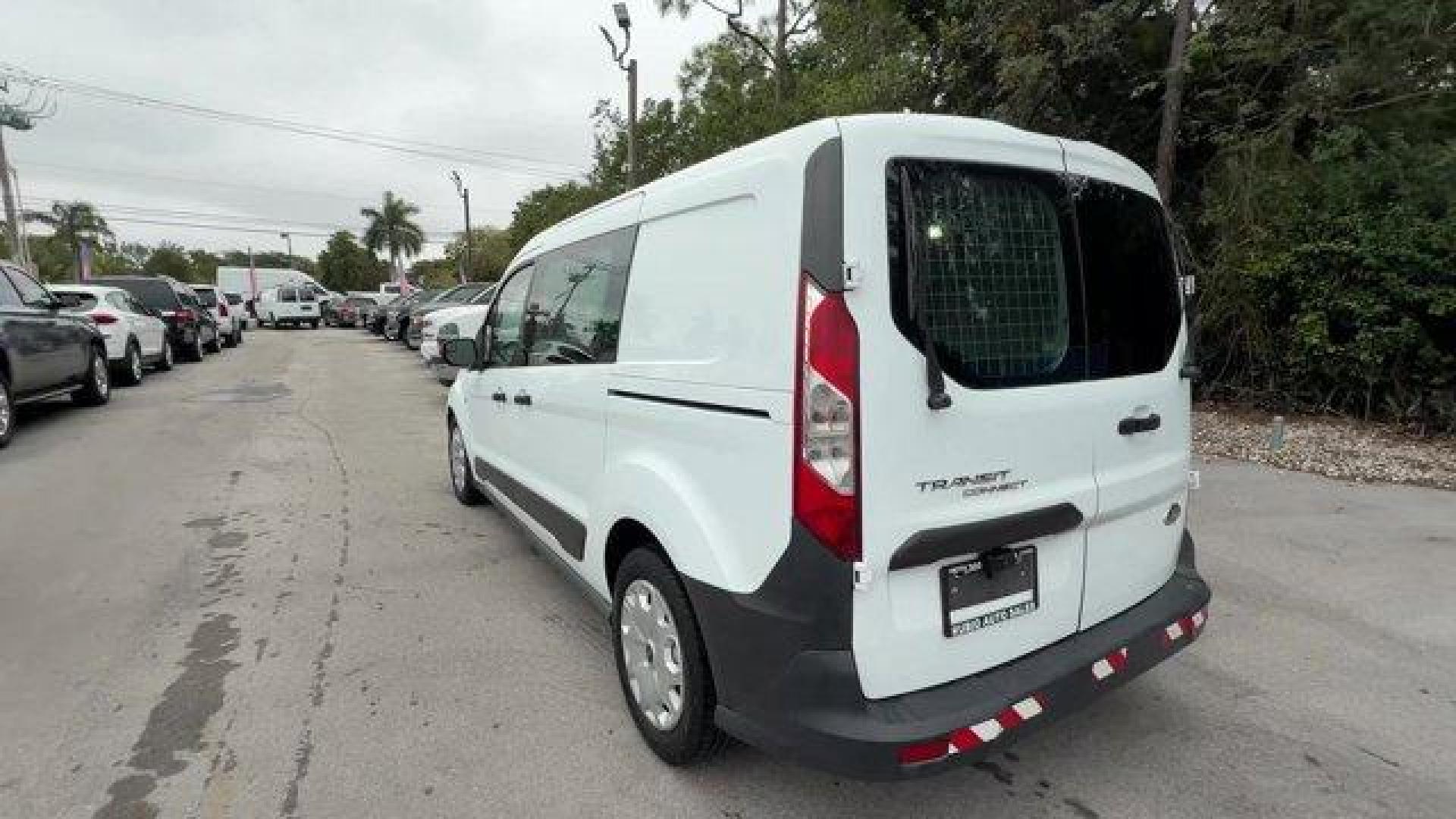 2014 White Ford Transit Connect (NM0LS7E72E1) with an 4 2.5 L engine, Automatic transmission, located at 27610 S Dixie Hwy, Homestead, FL, 33032, (305) 749-2348, 25.510241, -80.438301 - KBB.com Brand Image Awards. Only 128,470 Miles! Boasts 29 Highway MPG and 21 City MPG! This Ford Transit Connect boasts a Regular Unleaded I-4 2.5 L/152 engine powering this Automatic transmission. Wheels: 16 x 6.5 Steel w/XL Full Wheel Covers, Vinyl/Rubber Floor Trim, Vinyl Front Bucket Seats -inc: - Photo#2