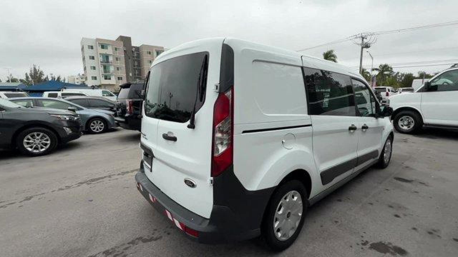 2014 White Ford Transit Connect (NM0LS7E72E1) with an 4 2.5 L engine, Automatic transmission, located at 27610 S Dixie Hwy, Homestead, FL, 33032, (305) 749-2348, 25.510241, -80.438301 - KBB.com Brand Image Awards. Only 128,470 Miles! Boasts 29 Highway MPG and 21 City MPG! This Ford Transit Connect boasts a Regular Unleaded I-4 2.5 L/152 engine powering this Automatic transmission. Wheels: 16 x 6.5 Steel w/XL Full Wheel Covers, Vinyl/Rubber Floor Trim, Vinyl Front Bucket Seats -inc: - Photo#4