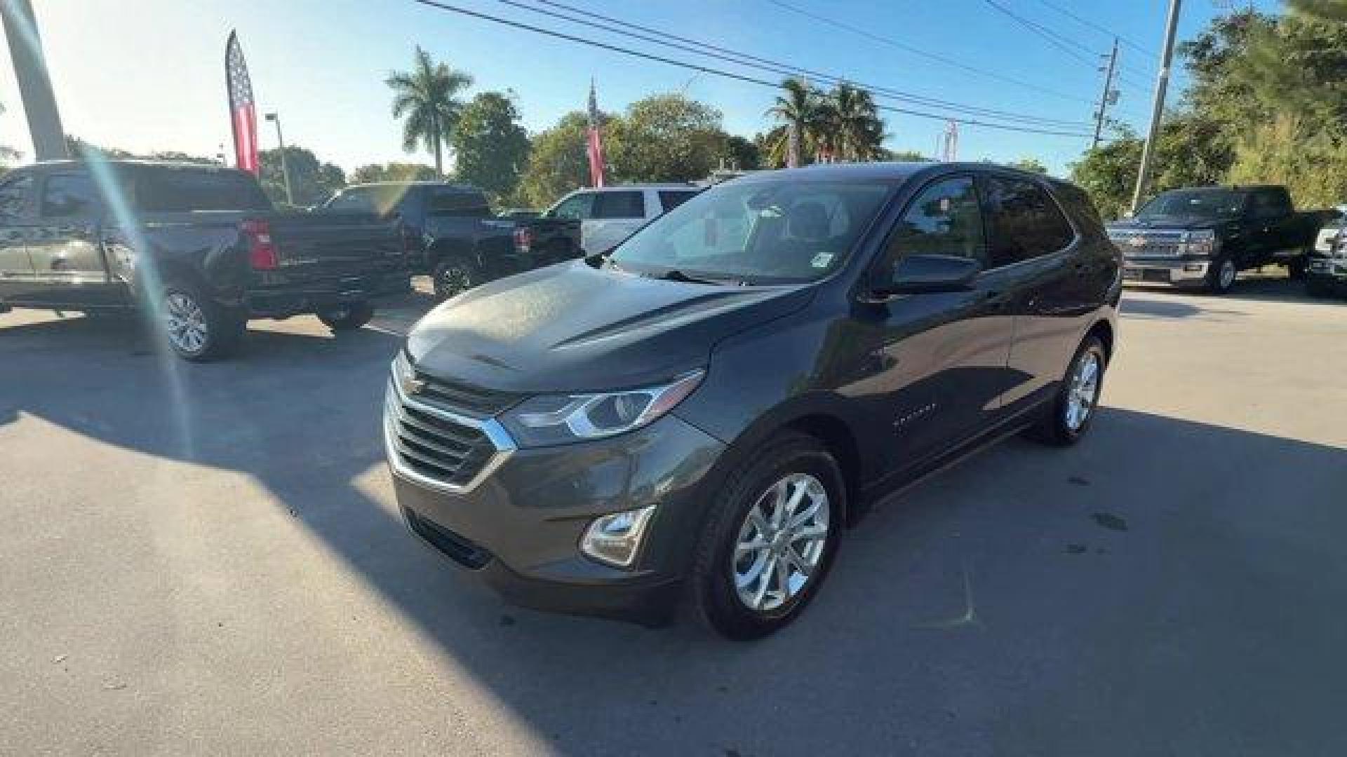 2020 Nightfall Gray Metallic /Jet Black Chevrolet Equinox (2GNAXJEV1L6) with an 4 1.5L engine, Automatic transmission, located at 27610 S Dixie Hwy, Homestead, FL, 33032, (305) 749-2348, 25.510241, -80.438301 - IIHS Top Safety Pick with specific headlights. Scores 31 Highway MPG and 26 City MPG! This Chevrolet Equinox boasts a Turbocharged Gas I4 1.5L/92 engine powering this Automatic transmission. UNIVERSAL HOME REMOTE includes garage door opener, programmable, TRANSMISSION, 6-SPEED AUTOMATIC, ELECTRONICA - Photo#0