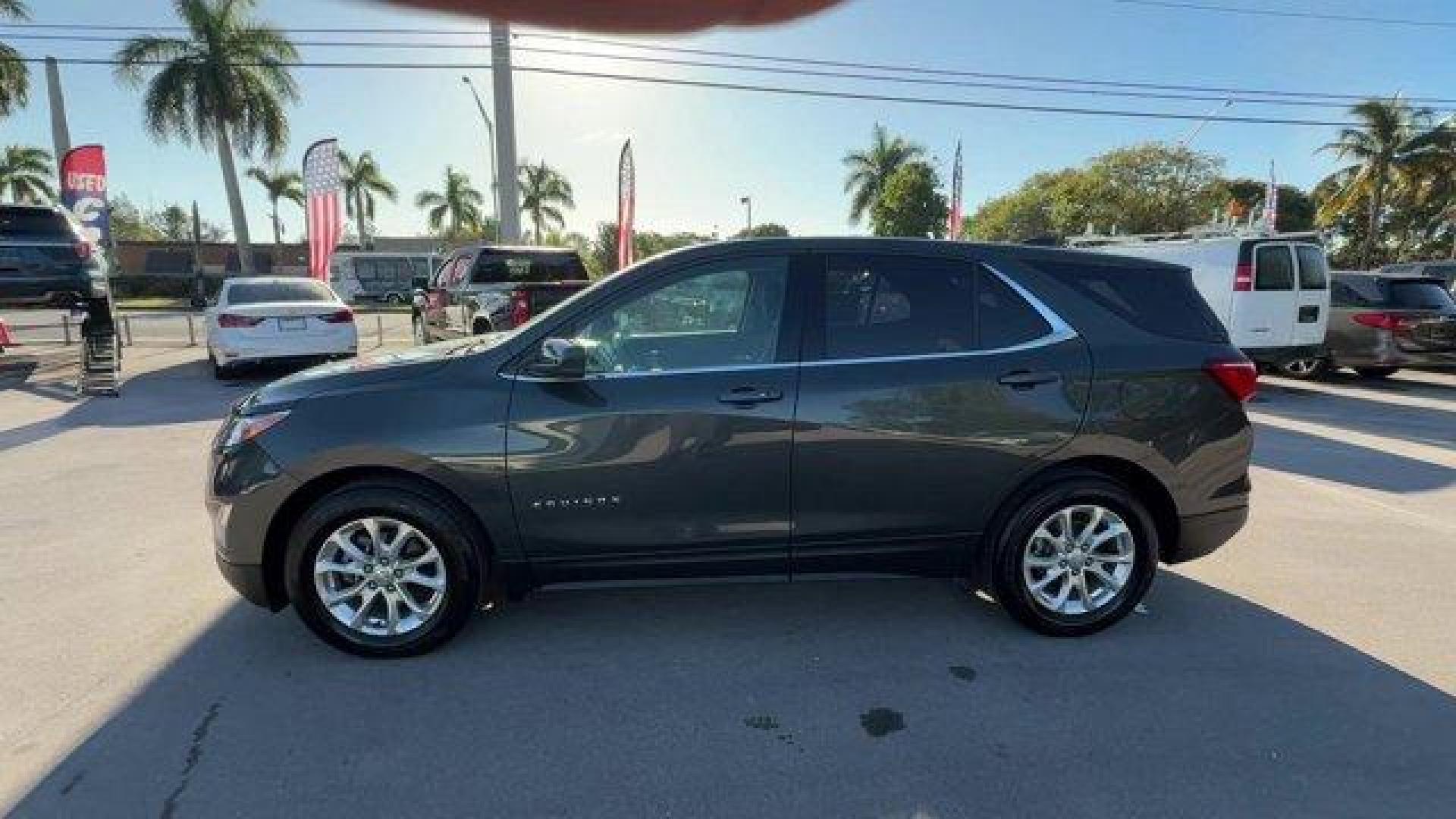 2020 Nightfall Gray Metallic /Jet Black Chevrolet Equinox (2GNAXJEV1L6) with an 4 1.5L engine, Automatic transmission, located at 27610 S Dixie Hwy, Homestead, FL, 33032, (305) 749-2348, 25.510241, -80.438301 - IIHS Top Safety Pick with specific headlights. Scores 31 Highway MPG and 26 City MPG! This Chevrolet Equinox boasts a Turbocharged Gas I4 1.5L/92 engine powering this Automatic transmission. UNIVERSAL HOME REMOTE includes garage door opener, programmable, TRANSMISSION, 6-SPEED AUTOMATIC, ELECTRONICA - Photo#1