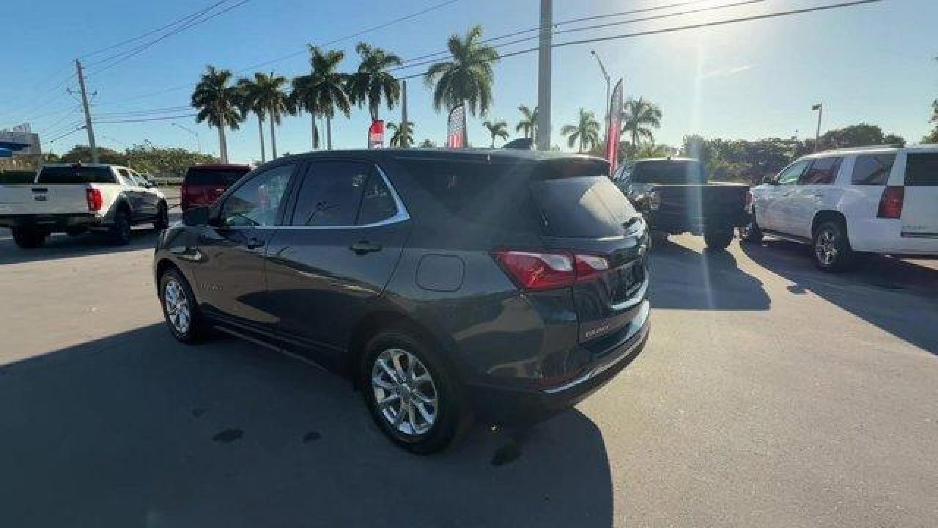 2020 Nightfall Gray Metallic /Jet Black Chevrolet Equinox (2GNAXJEV1L6) with an 4 1.5L engine, Automatic transmission, located at 27610 S Dixie Hwy, Homestead, FL, 33032, (305) 749-2348, 25.510241, -80.438301 - IIHS Top Safety Pick with specific headlights. Scores 31 Highway MPG and 26 City MPG! This Chevrolet Equinox boasts a Turbocharged Gas I4 1.5L/92 engine powering this Automatic transmission. UNIVERSAL HOME REMOTE includes garage door opener, programmable, TRANSMISSION, 6-SPEED AUTOMATIC, ELECTRONICA - Photo#2