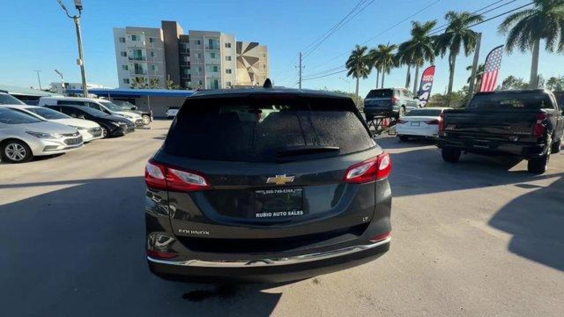 2020 Nightfall Gray Metallic /Jet Black Chevrolet Equinox (2GNAXJEV1L6) with an 4 1.5L engine, Automatic transmission, located at 27610 S Dixie Hwy, Homestead, FL, 33032, (305) 749-2348, 25.510241, -80.438301 - IIHS Top Safety Pick with specific headlights. Scores 31 Highway MPG and 26 City MPG! This Chevrolet Equinox boasts a Turbocharged Gas I4 1.5L/92 engine powering this Automatic transmission. UNIVERSAL HOME REMOTE includes garage door opener, programmable, TRANSMISSION, 6-SPEED AUTOMATIC, ELECTRONICA - Photo#3