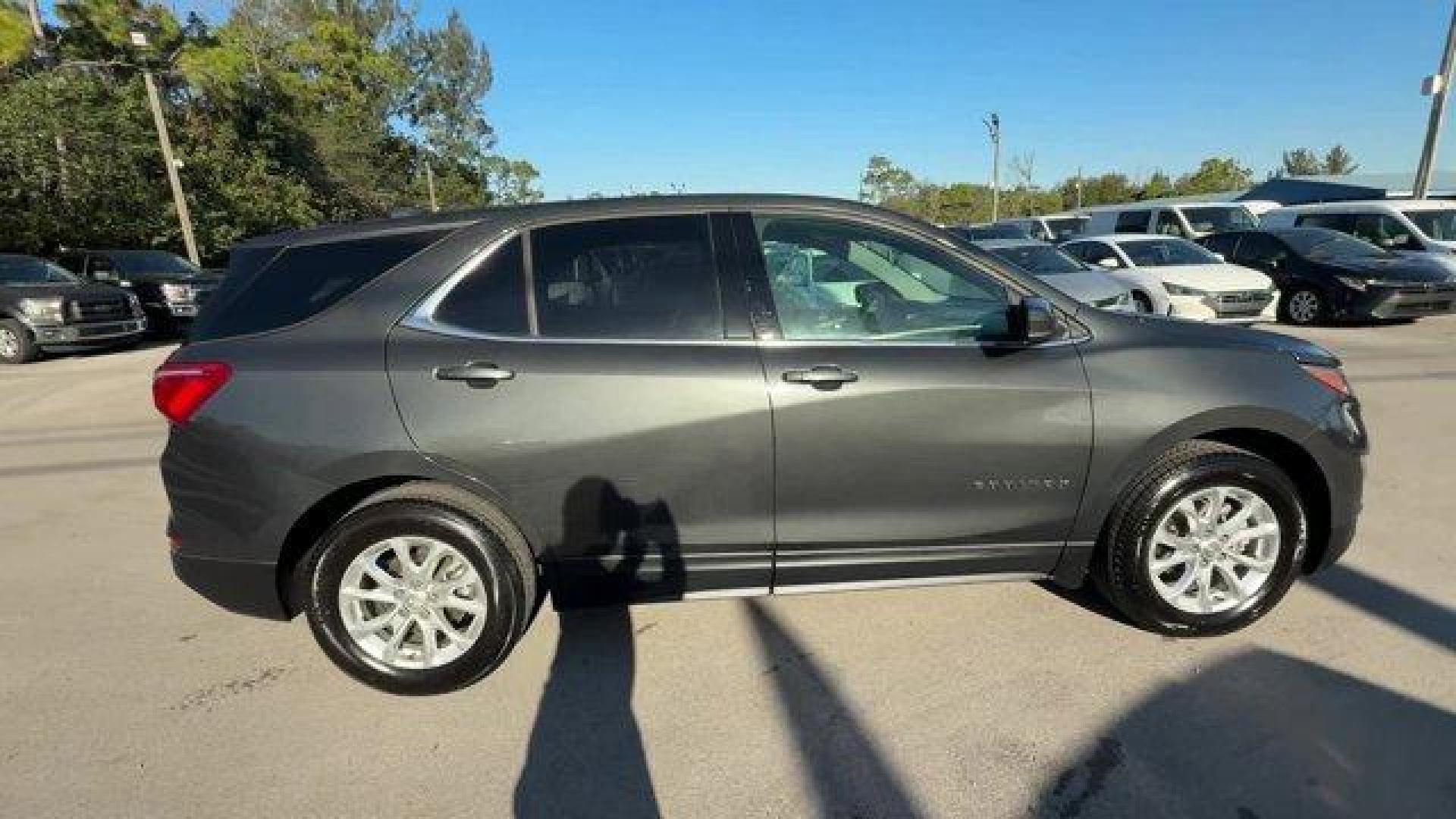 2020 Nightfall Gray Metallic /Jet Black Chevrolet Equinox (2GNAXJEV1L6) with an 4 1.5L engine, Automatic transmission, located at 27610 S Dixie Hwy, Homestead, FL, 33032, (305) 749-2348, 25.510241, -80.438301 - IIHS Top Safety Pick with specific headlights. Scores 31 Highway MPG and 26 City MPG! This Chevrolet Equinox boasts a Turbocharged Gas I4 1.5L/92 engine powering this Automatic transmission. UNIVERSAL HOME REMOTE includes garage door opener, programmable, TRANSMISSION, 6-SPEED AUTOMATIC, ELECTRONICA - Photo#5