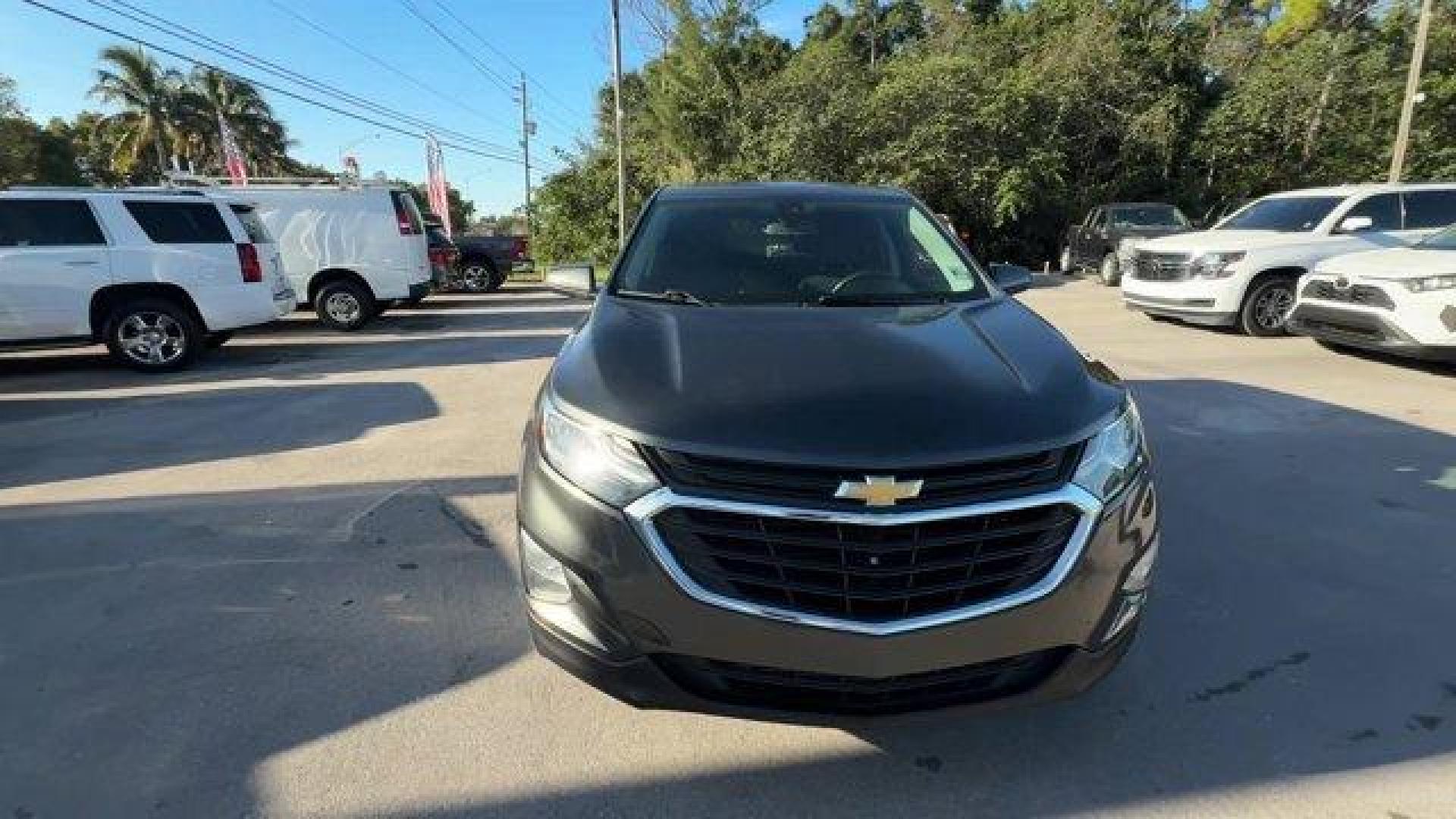 2020 Nightfall Gray Metallic /Jet Black Chevrolet Equinox (2GNAXJEV1L6) with an 4 1.5L engine, Automatic transmission, located at 27610 S Dixie Hwy, Homestead, FL, 33032, (305) 749-2348, 25.510241, -80.438301 - IIHS Top Safety Pick with specific headlights. Scores 31 Highway MPG and 26 City MPG! This Chevrolet Equinox boasts a Turbocharged Gas I4 1.5L/92 engine powering this Automatic transmission. UNIVERSAL HOME REMOTE includes garage door opener, programmable, TRANSMISSION, 6-SPEED AUTOMATIC, ELECTRONICA - Photo#7