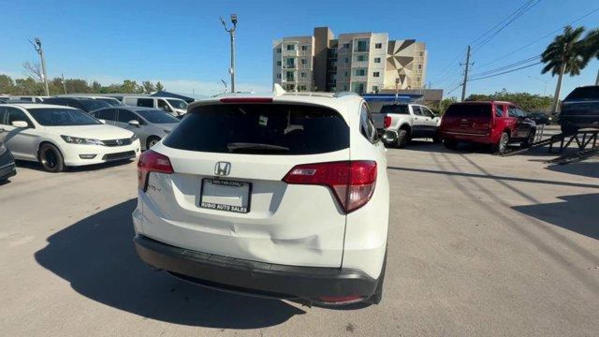 2017 White Honda HR-V (3CZRU5H74HM) with an 4 1.8 L engine, Variable transmission, located at 27610 S Dixie Hwy, Homestead, FL, 33032, (305) 749-2348, 25.510241, -80.438301 - KBB.com Brand Image Awards. Delivers 34 Highway MPG and 28 City MPG! This Honda HR-V boasts a Regular Unleaded I-4 1.8 L/110 engine powering this Variable transmission. Wheels: 17 Alloy, VSA Electronic Stability Control (ESC), Variable Intermittent Wipers.* This Honda HR-V Features the Following Opt - Photo#4