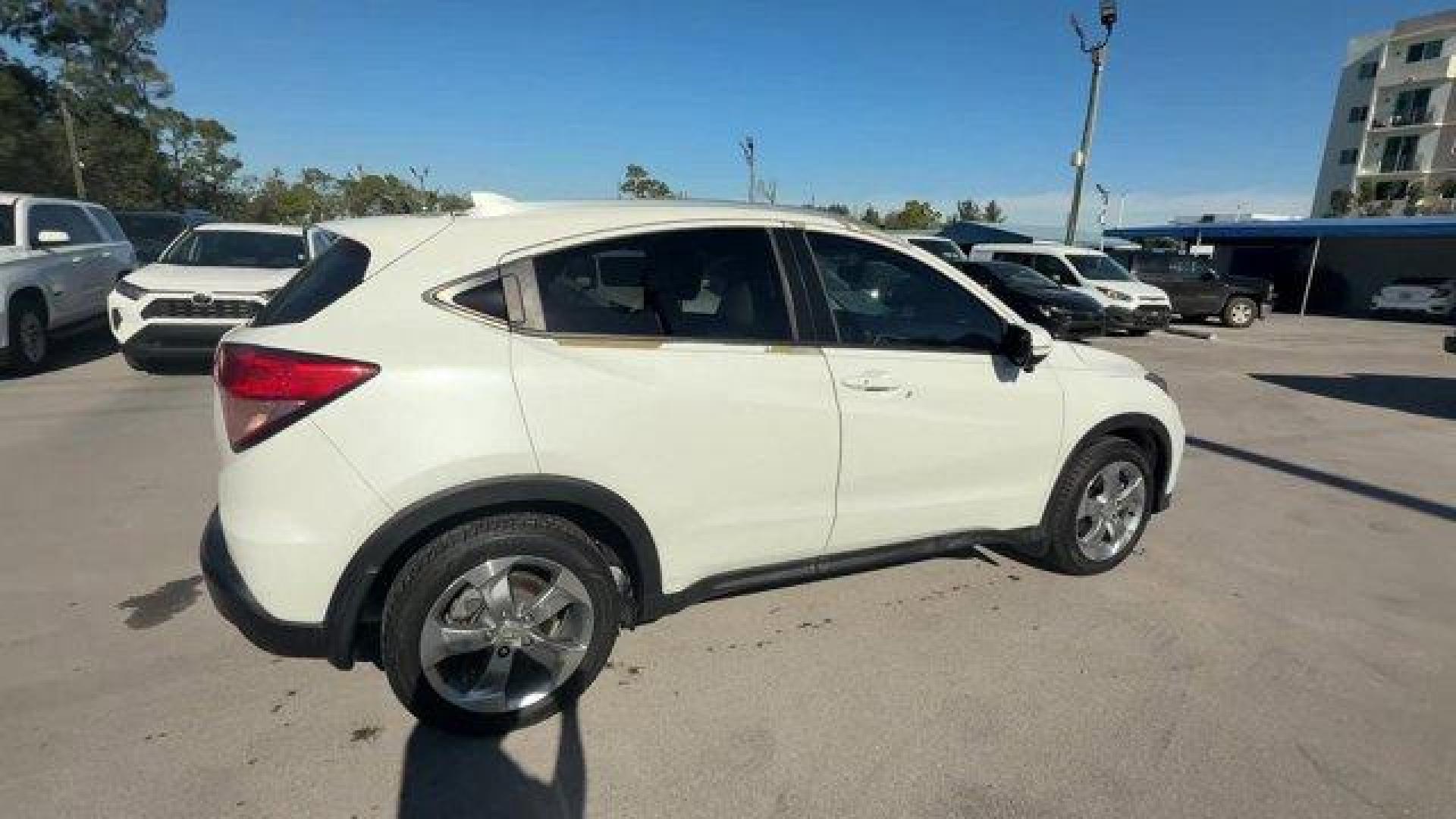 2017 White Honda HR-V (3CZRU5H74HM) with an 4 1.8 L engine, Variable transmission, located at 27610 S Dixie Hwy, Homestead, FL, 33032, (305) 749-2348, 25.510241, -80.438301 - KBB.com Brand Image Awards. Delivers 34 Highway MPG and 28 City MPG! This Honda HR-V boasts a Regular Unleaded I-4 1.8 L/110 engine powering this Variable transmission. Wheels: 17 Alloy, VSA Electronic Stability Control (ESC), Variable Intermittent Wipers.* This Honda HR-V Features the Following Opt - Photo#5