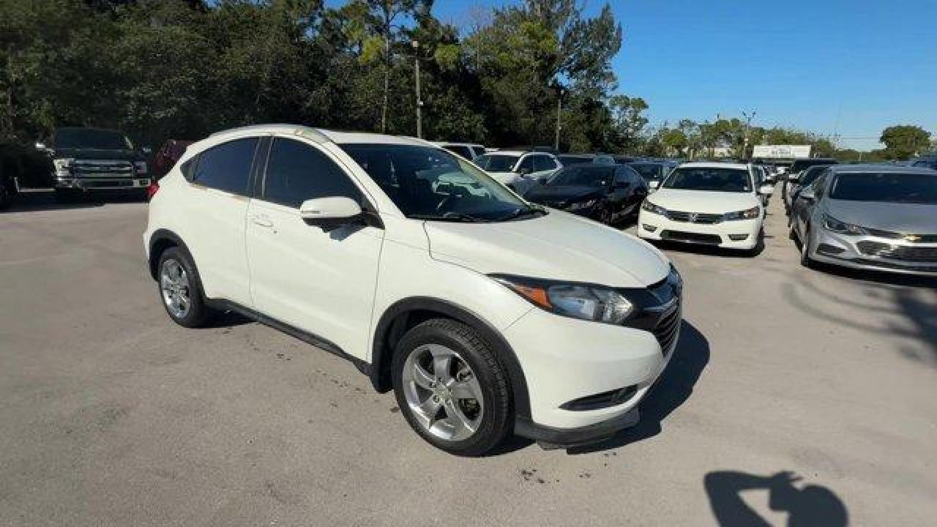 2017 White Honda HR-V (3CZRU5H74HM) with an 4 1.8 L engine, Variable transmission, located at 27610 S Dixie Hwy, Homestead, FL, 33032, (305) 749-2348, 25.510241, -80.438301 - KBB.com Brand Image Awards. Delivers 34 Highway MPG and 28 City MPG! This Honda HR-V boasts a Regular Unleaded I-4 1.8 L/110 engine powering this Variable transmission. Wheels: 17 Alloy, VSA Electronic Stability Control (ESC), Variable Intermittent Wipers.* This Honda HR-V Features the Following Opt - Photo#6