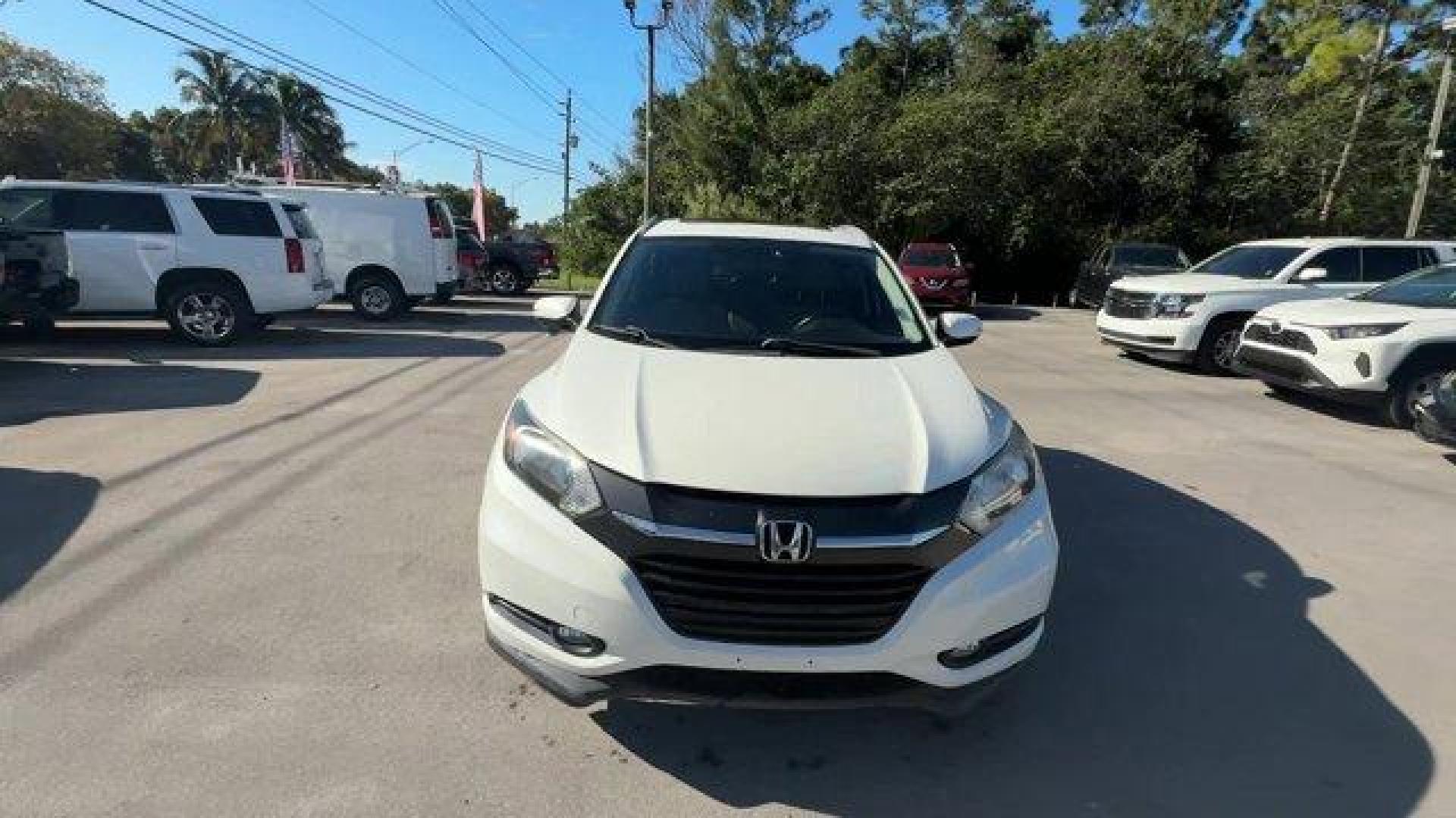 2017 White Honda HR-V (3CZRU5H74HM) with an 4 1.8 L engine, Variable transmission, located at 27610 S Dixie Hwy, Homestead, FL, 33032, (305) 749-2348, 25.510241, -80.438301 - KBB.com Brand Image Awards. Delivers 34 Highway MPG and 28 City MPG! This Honda HR-V boasts a Regular Unleaded I-4 1.8 L/110 engine powering this Variable transmission. Wheels: 17 Alloy, VSA Electronic Stability Control (ESC), Variable Intermittent Wipers.* This Honda HR-V Features the Following Opt - Photo#7