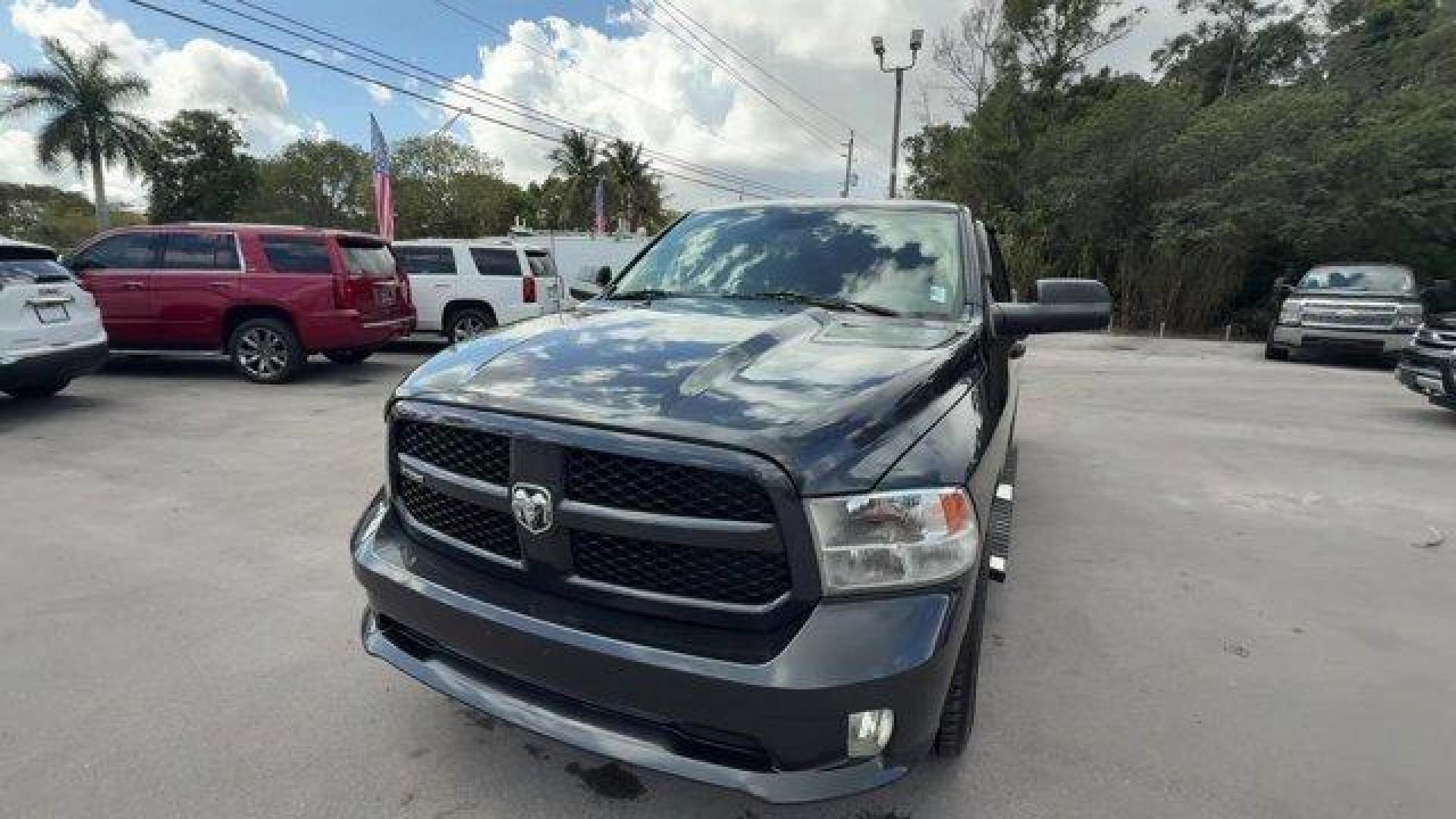 2014 Maximum Steel Metallic Clearcoat /Diesel Gray/Black Ram 1500 (1C6RR7FT7ES) with an 8 5.7 L engine, Automatic transmission, located at 27610 S Dixie Hwy, Homestead, FL, 33032, (305) 749-2348, 25.510241, -80.438301 - Delivers 21 Highway MPG and 15 City MPG! This Ram 1500 boasts a Regular Unleaded V-8 5.7 L/345 engine powering this Automatic transmission. WHEELS: 20 X 9 CHROME CLAD ALUMINUM -inc: Locking Lug Nuts, Tires: P275/60R20 OWL AS, TRANSMISSION: 8-SPEED AUTOMATIC (8HP70), TRAILER TOW MIRRORS and BRAKE G - Photo#0