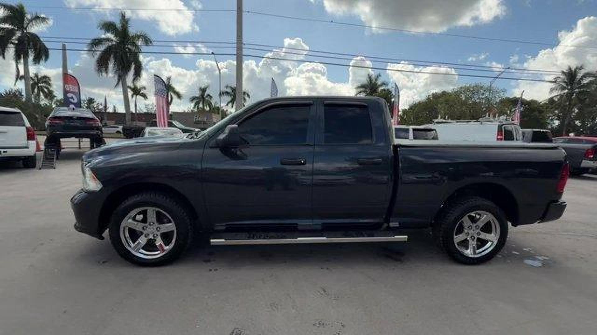 2014 Maximum Steel Metallic Clearcoat /Diesel Gray/Black Ram 1500 (1C6RR7FT7ES) with an 8 5.7 L engine, Automatic transmission, located at 27610 S Dixie Hwy, Homestead, FL, 33032, (305) 749-2348, 25.510241, -80.438301 - Delivers 21 Highway MPG and 15 City MPG! This Ram 1500 boasts a Regular Unleaded V-8 5.7 L/345 engine powering this Automatic transmission. WHEELS: 20 X 9 CHROME CLAD ALUMINUM -inc: Locking Lug Nuts, Tires: P275/60R20 OWL AS, TRANSMISSION: 8-SPEED AUTOMATIC (8HP70), TRAILER TOW MIRRORS and BRAKE G - Photo#1