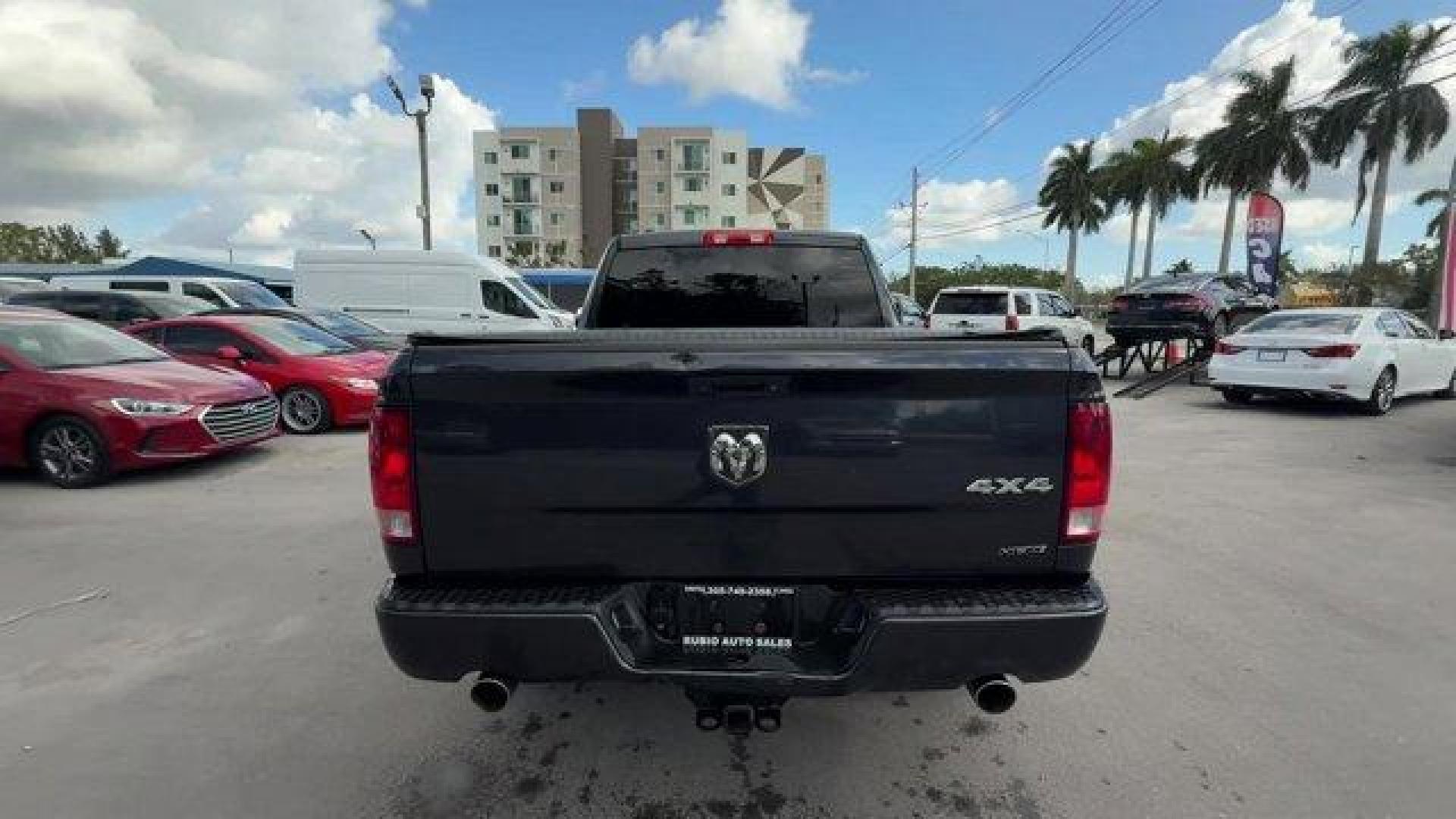 2014 Maximum Steel Metallic Clearcoat /Diesel Gray/Black Ram 1500 (1C6RR7FT7ES) with an 8 5.7 L engine, Automatic transmission, located at 27610 S Dixie Hwy, Homestead, FL, 33032, (305) 749-2348, 25.510241, -80.438301 - Delivers 21 Highway MPG and 15 City MPG! This Ram 1500 boasts a Regular Unleaded V-8 5.7 L/345 engine powering this Automatic transmission. WHEELS: 20 X 9 CHROME CLAD ALUMINUM -inc: Locking Lug Nuts, Tires: P275/60R20 OWL AS, TRANSMISSION: 8-SPEED AUTOMATIC (8HP70), TRAILER TOW MIRRORS and BRAKE G - Photo#3