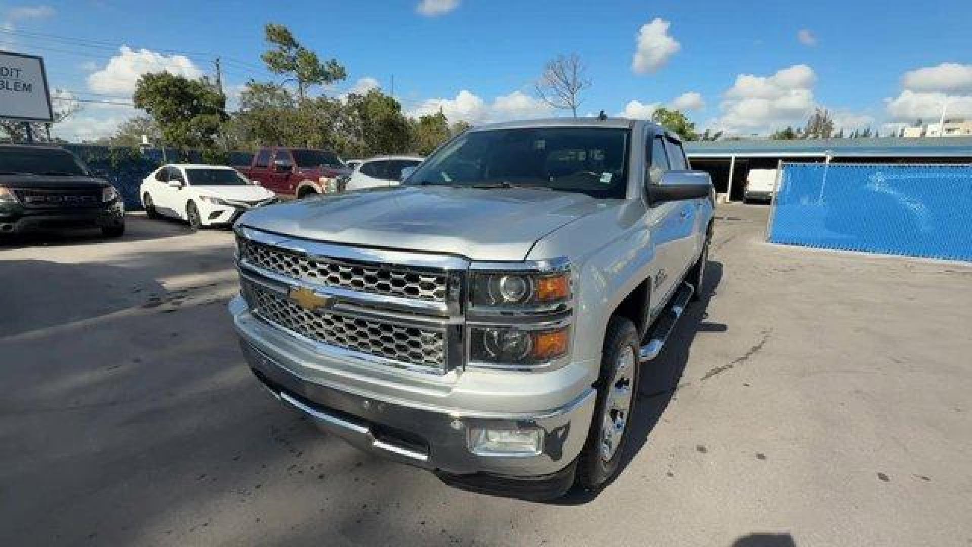 2014 Silver Ice Metallic /Jet Black Chevrolet Silverado 1500 (3GCPCSEC9EG) with an 8 5.3L engine, Automatic transmission, located at 27610 S Dixie Hwy, Homestead, FL, 33032, (305) 749-2348, 25.510241, -80.438301 - NACTOY 2014 North American Truck of the Year. Only 82,803 Miles! Scores 23 Highway MPG and 16 City MPG! This Chevrolet Silverado 1500 delivers a Gas/Ethanol V8 5.3L/325 engine powering this Automatic transmission. WHEELS, 20 X 9 (50.8 CM X 22.9 CM) CHROME, TRANSMISSION, 6-SPEED AUTOMATIC, ELECTRONIC - Photo#0