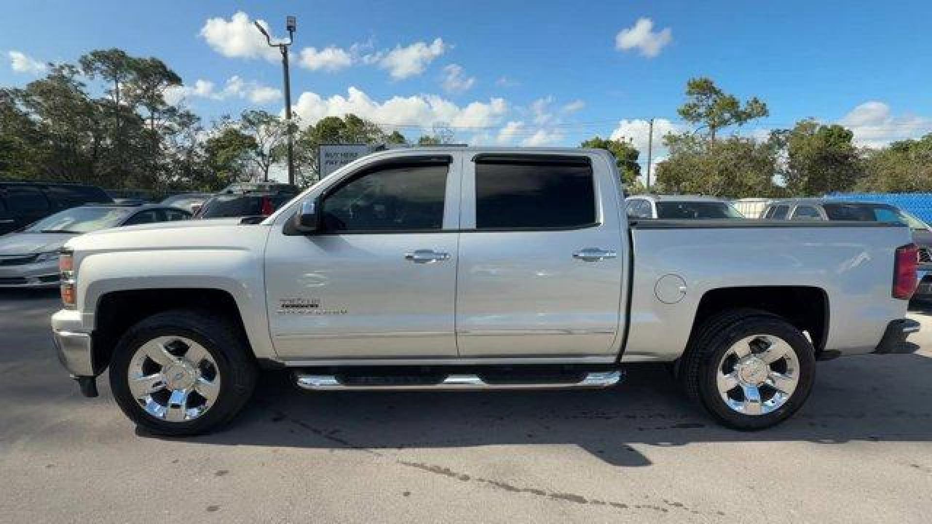 2014 Silver Ice Metallic /Jet Black Chevrolet Silverado 1500 (3GCPCSEC9EG) with an 8 5.3L engine, Automatic transmission, located at 27610 S Dixie Hwy, Homestead, FL, 33032, (305) 749-2348, 25.510241, -80.438301 - NACTOY 2014 North American Truck of the Year. Only 82,803 Miles! Scores 23 Highway MPG and 16 City MPG! This Chevrolet Silverado 1500 delivers a Gas/Ethanol V8 5.3L/325 engine powering this Automatic transmission. WHEELS, 20 X 9 (50.8 CM X 22.9 CM) CHROME, TRANSMISSION, 6-SPEED AUTOMATIC, ELECTRONIC - Photo#1