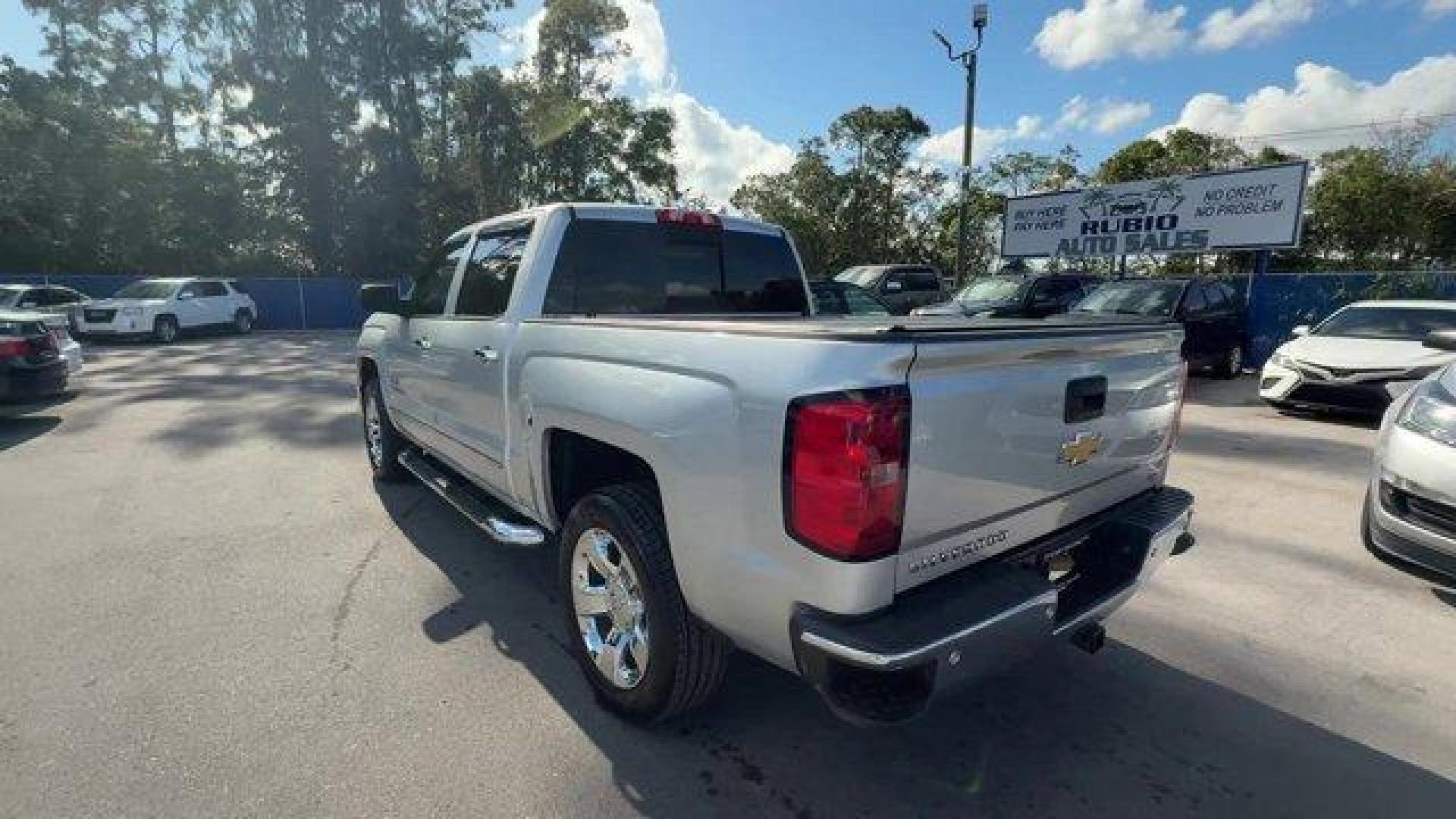 2014 Silver Ice Metallic /Jet Black Chevrolet Silverado 1500 (3GCPCSEC9EG) with an 8 5.3L engine, Automatic transmission, located at 27610 S Dixie Hwy, Homestead, FL, 33032, (305) 749-2348, 25.510241, -80.438301 - NACTOY 2014 North American Truck of the Year. Only 82,803 Miles! Scores 23 Highway MPG and 16 City MPG! This Chevrolet Silverado 1500 delivers a Gas/Ethanol V8 5.3L/325 engine powering this Automatic transmission. WHEELS, 20 X 9 (50.8 CM X 22.9 CM) CHROME, TRANSMISSION, 6-SPEED AUTOMATIC, ELECTRONIC - Photo#2