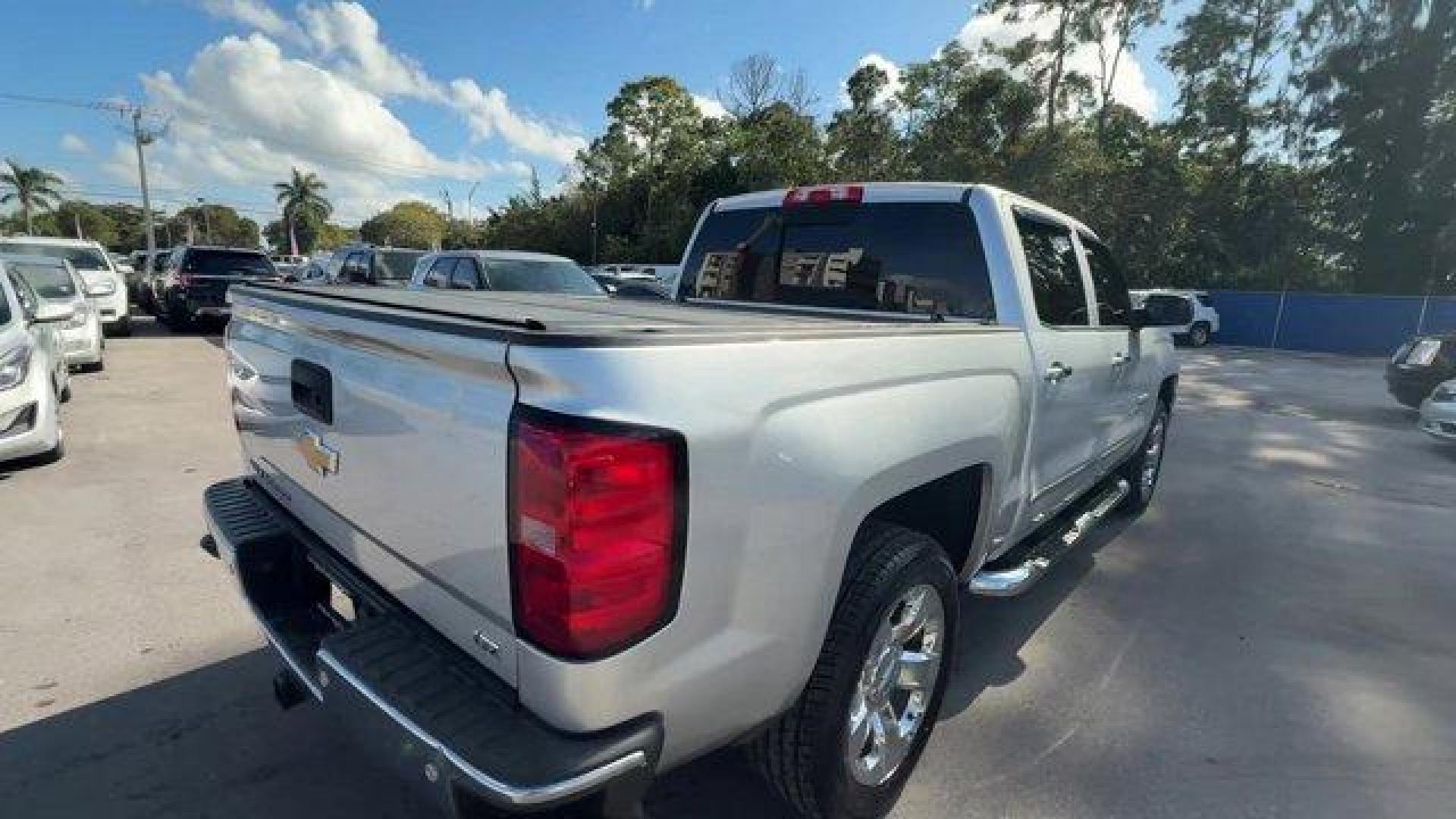 2014 Silver Ice Metallic /Jet Black Chevrolet Silverado 1500 (3GCPCSEC9EG) with an 8 5.3L engine, Automatic transmission, located at 27610 S Dixie Hwy, Homestead, FL, 33032, (305) 749-2348, 25.510241, -80.438301 - NACTOY 2014 North American Truck of the Year. Only 82,803 Miles! Scores 23 Highway MPG and 16 City MPG! This Chevrolet Silverado 1500 delivers a Gas/Ethanol V8 5.3L/325 engine powering this Automatic transmission. WHEELS, 20 X 9 (50.8 CM X 22.9 CM) CHROME, TRANSMISSION, 6-SPEED AUTOMATIC, ELECTRONIC - Photo#4