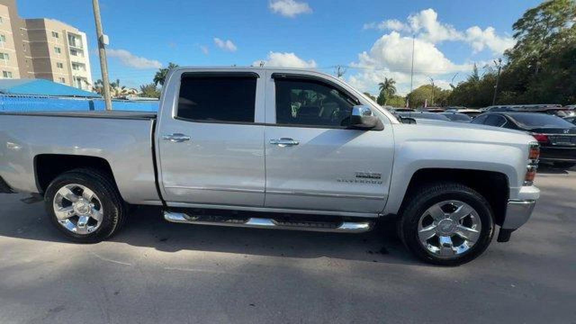 2014 Silver Ice Metallic /Jet Black Chevrolet Silverado 1500 (3GCPCSEC9EG) with an 8 5.3L engine, Automatic transmission, located at 27610 S Dixie Hwy, Homestead, FL, 33032, (305) 749-2348, 25.510241, -80.438301 - NACTOY 2014 North American Truck of the Year. Only 82,803 Miles! Scores 23 Highway MPG and 16 City MPG! This Chevrolet Silverado 1500 delivers a Gas/Ethanol V8 5.3L/325 engine powering this Automatic transmission. WHEELS, 20 X 9 (50.8 CM X 22.9 CM) CHROME, TRANSMISSION, 6-SPEED AUTOMATIC, ELECTRONIC - Photo#5