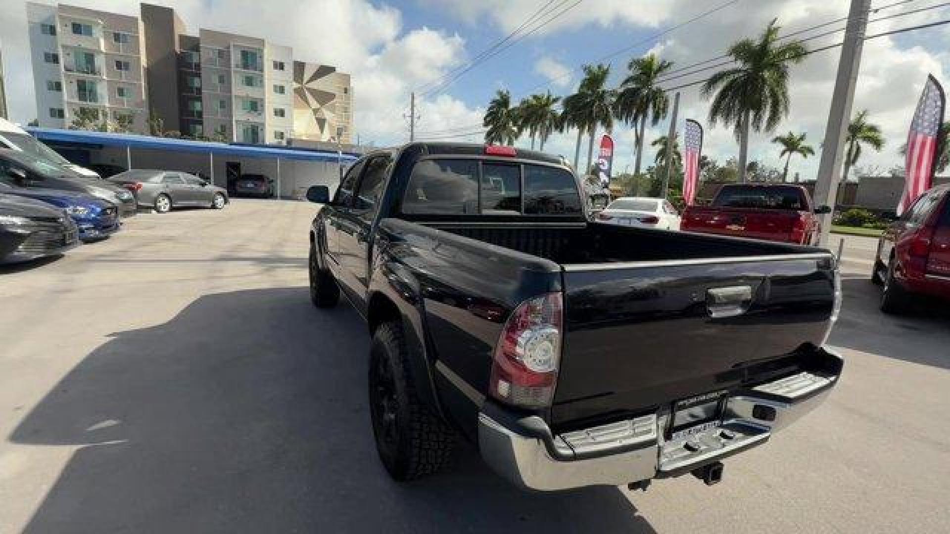 2014 Black Toyota Tacoma (5TFJU4GN3EX) with an 6 4.0 L engine, Automatic transmission, located at 27610 S Dixie Hwy, Homestead, FL, 33032, (305) 749-2348, 25.510241, -80.438301 - KBB.com Best Resale Value Awards. Only 104,374 Miles! Delivers 21 Highway MPG and 17 City MPG! This Toyota Tacoma boasts a Regular Unleaded V-6 4.0 L/241 engine powering this Automatic transmission. Wheels: 16 x 7J+30 Style Steel, Urethane Gear Shifter Material, Transmission: 5-Speed Automatic w/ECT - Photo#2